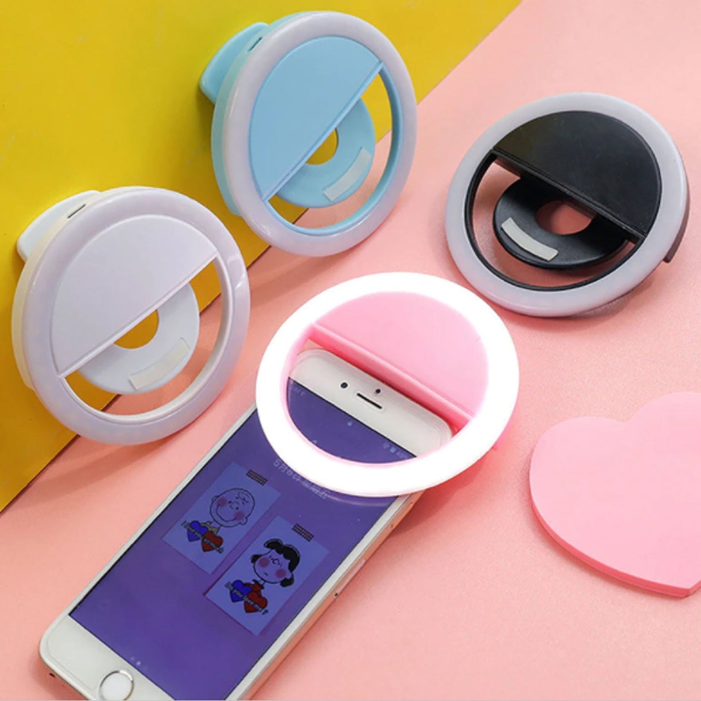 LED ring light for selfies showing its simple button controls and power input.