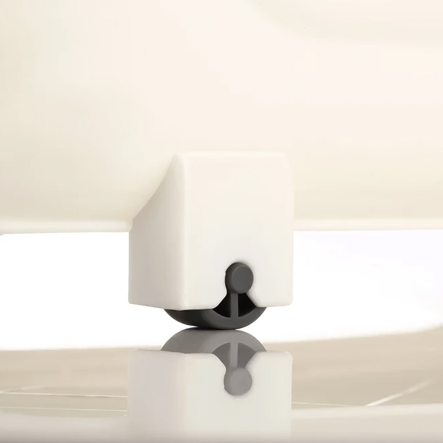 Side angle view demonstrating ergonomic handle and wheel mechanism