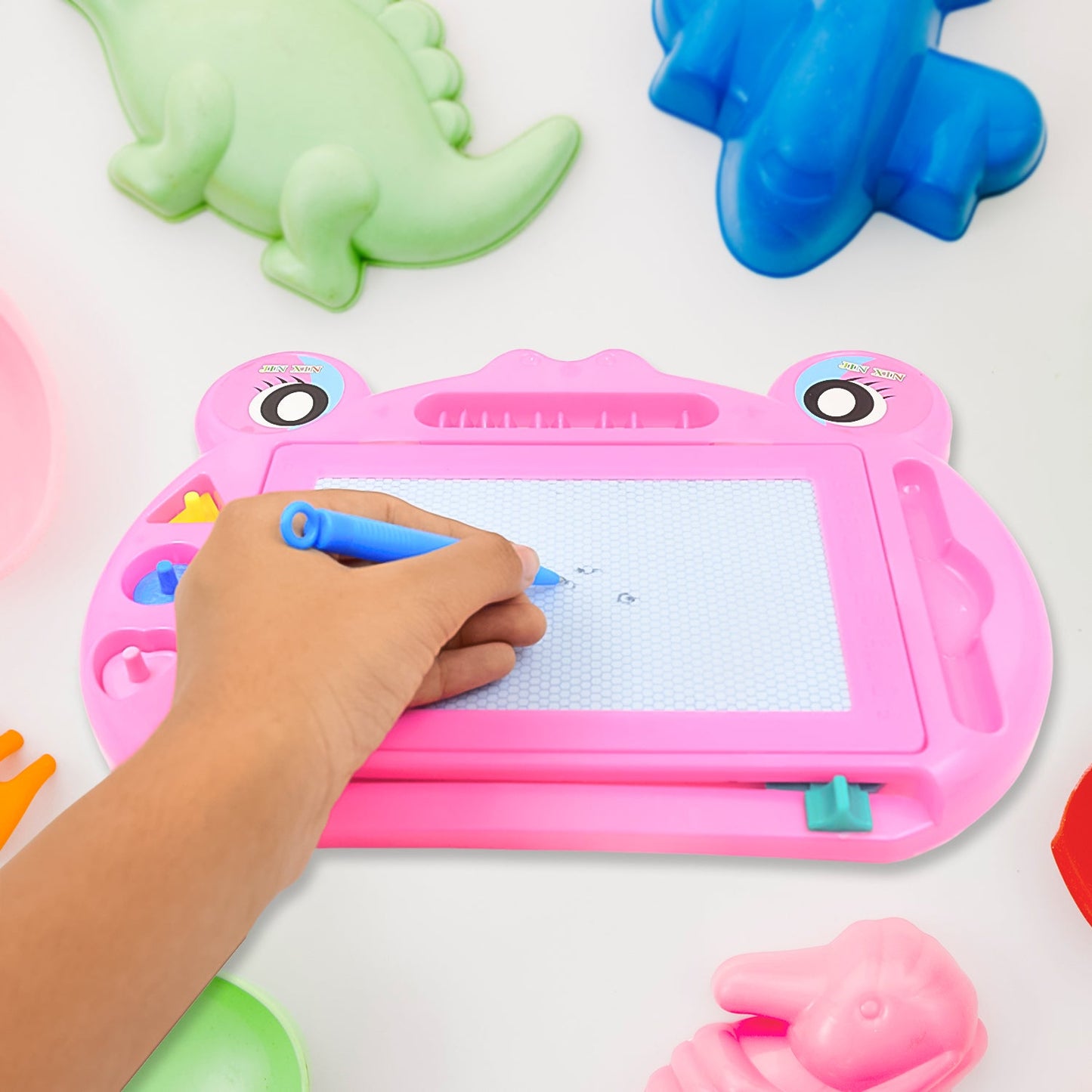 Green frog-themed drawing slate with its magnetic stylus.
