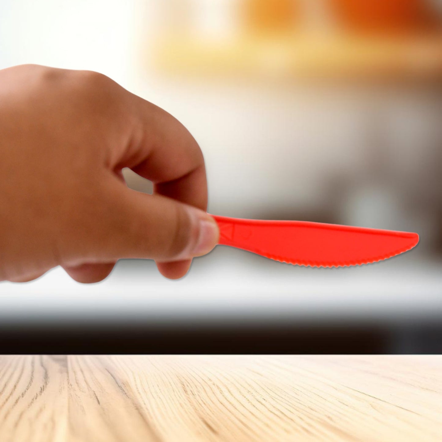 Red plastic knives set with ergonomic design for comfortable grip