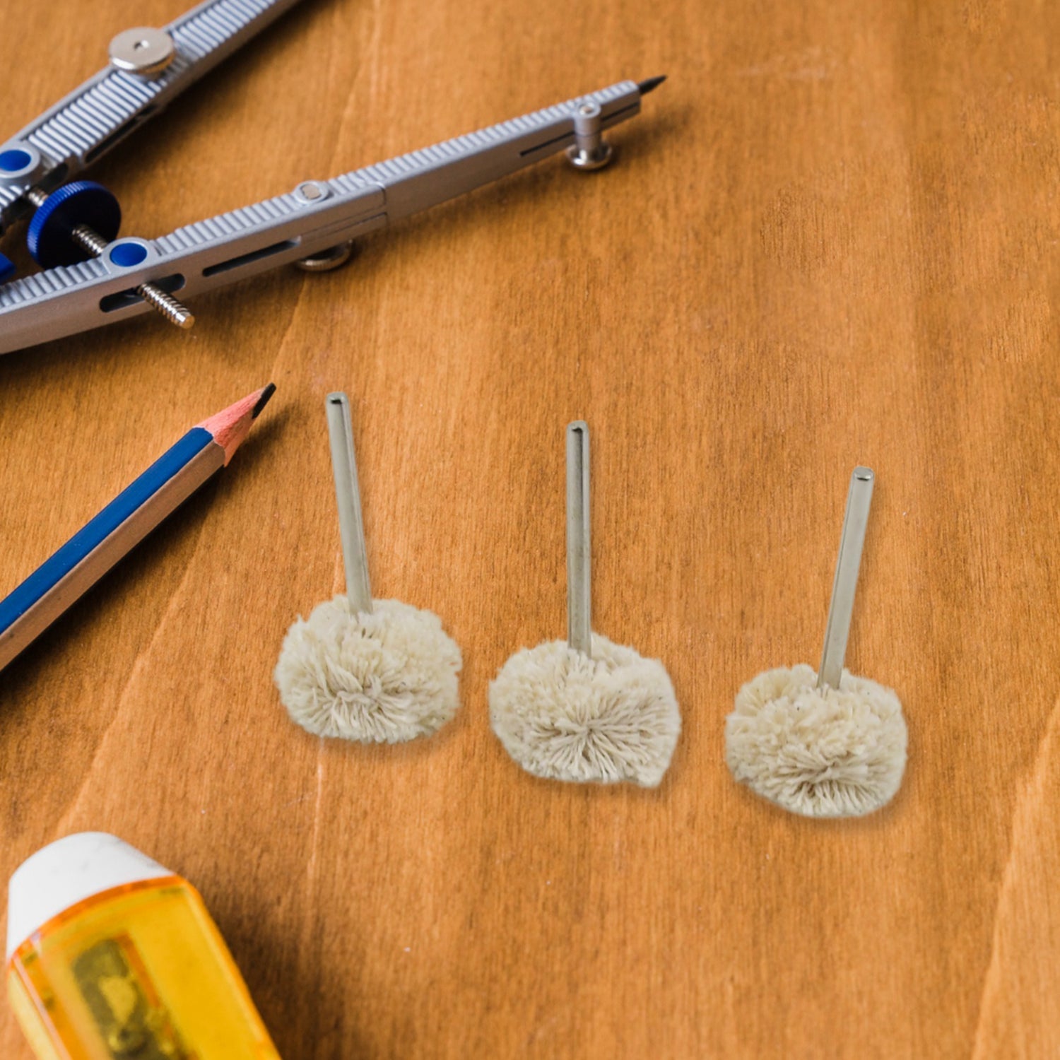 The 3-piece cotton polishing wheel set, ready for use with your Dremel polishing kit.
