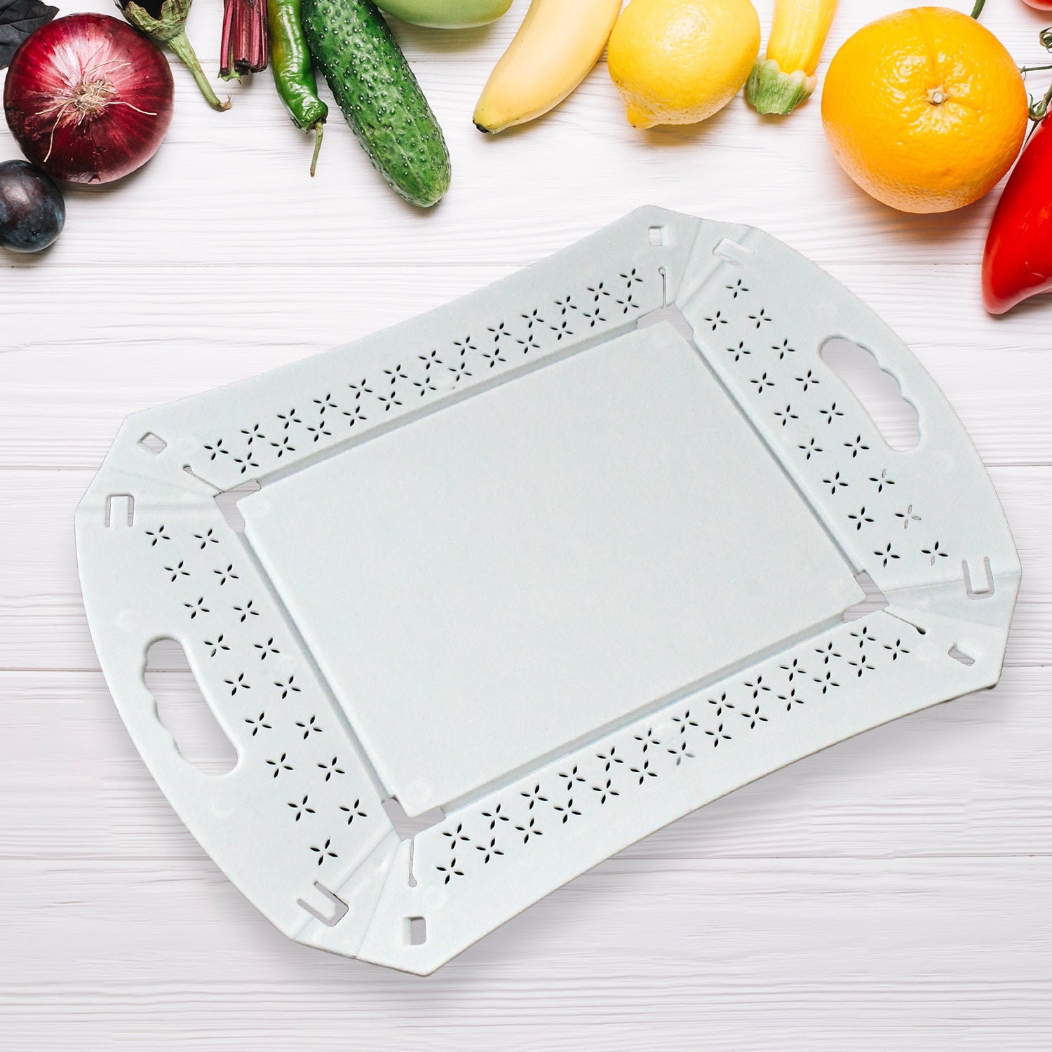 Close-up view of the sturdy handle and smooth surface of the foldable serving tray.