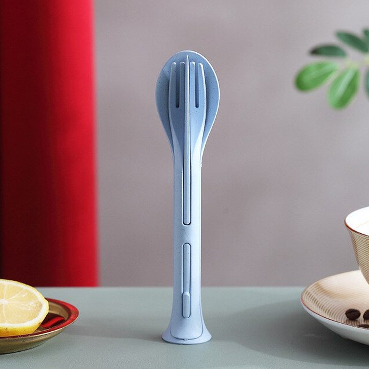 A complete 3-in-1 reusable cutlery set, featuring a spoon, fork, and knife, neatly arranged for travel.