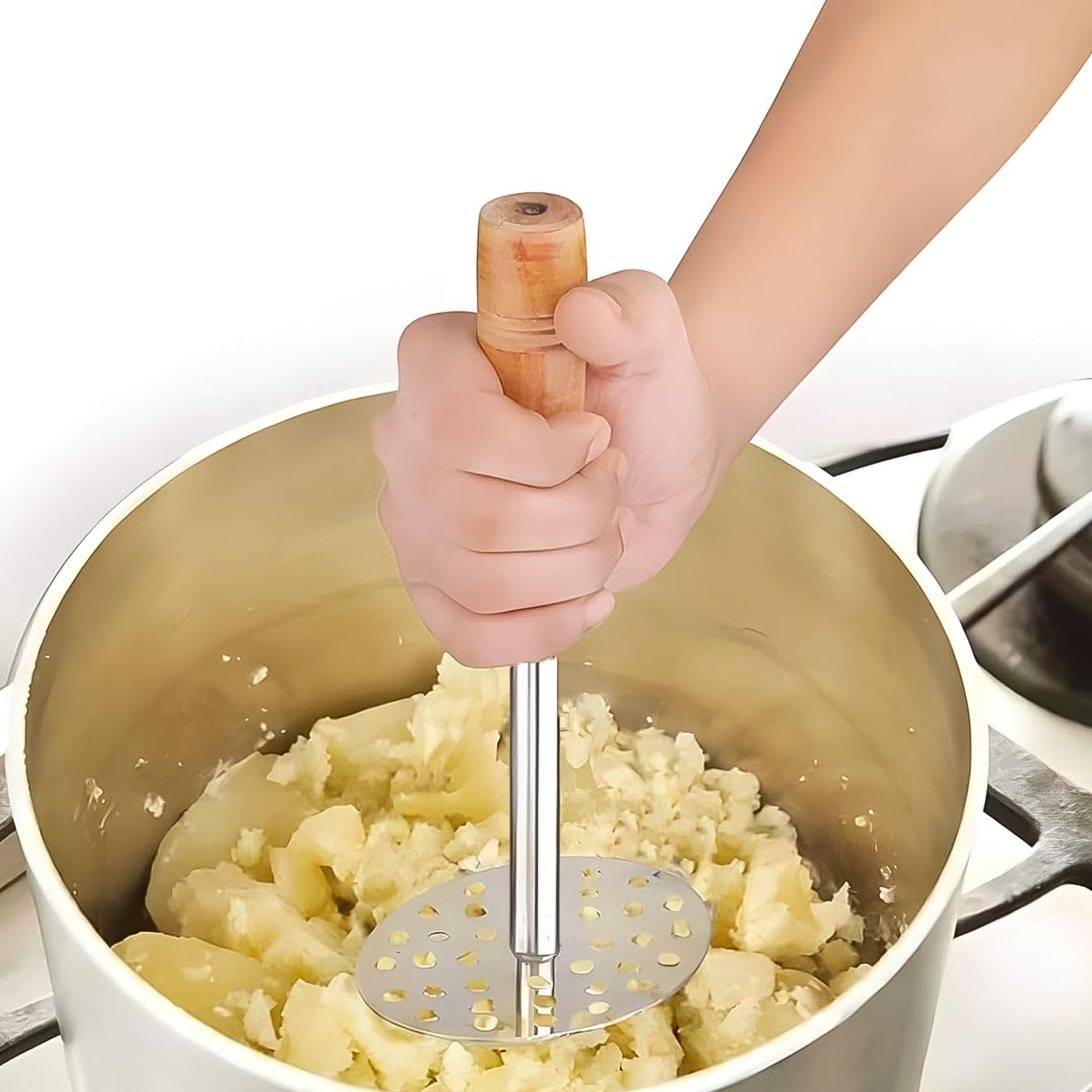 Close-up of the robust stainless steel mashing head on the pav bhaji masher.