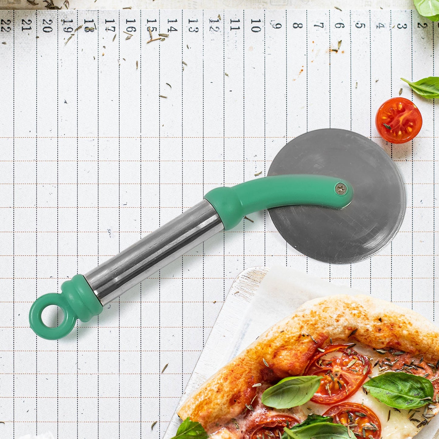 The durable stainless steel wheel of the Quickslice pizza cutter, showcasing its sharpness.