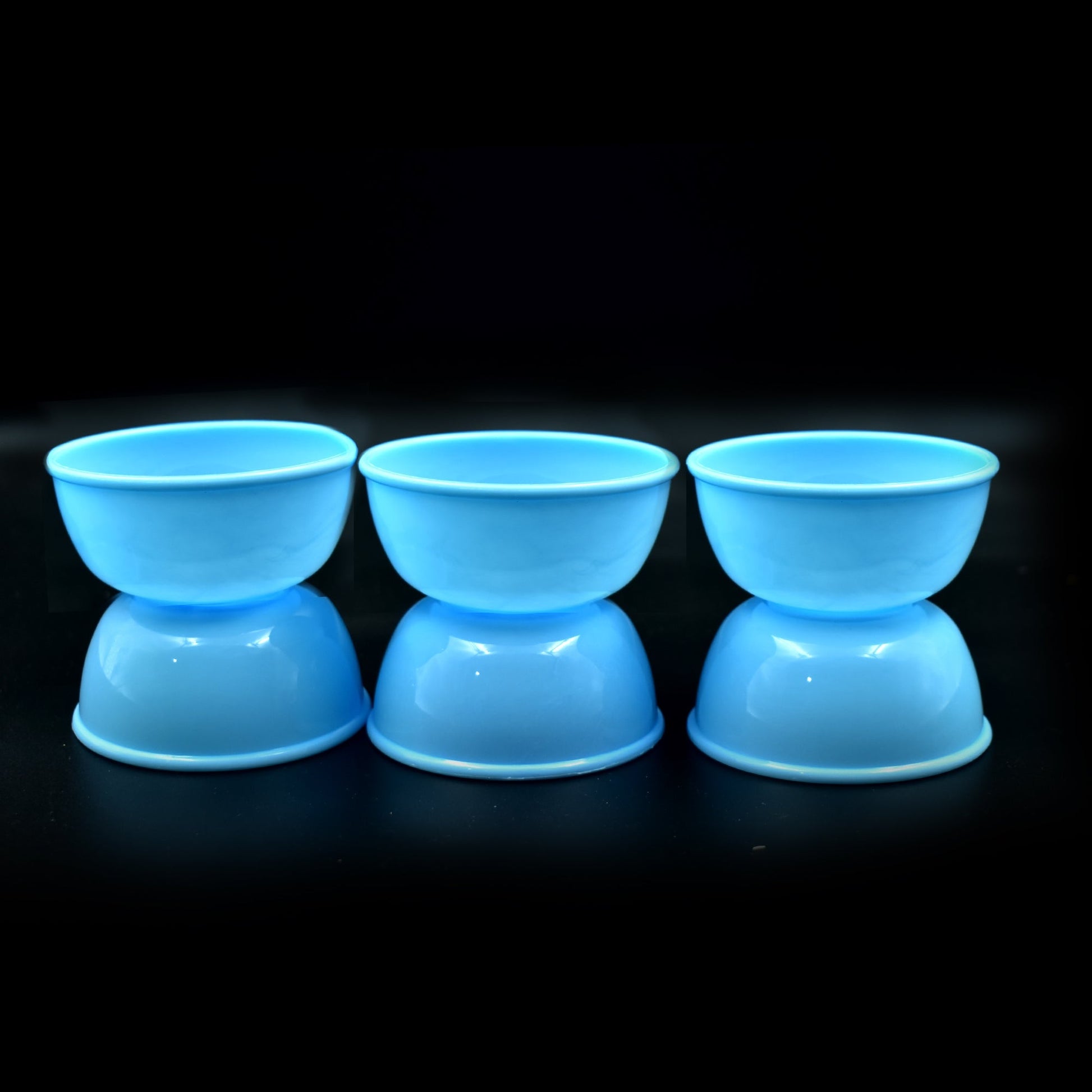 Collection of small, microwave-safe plastic bowls in various colors.