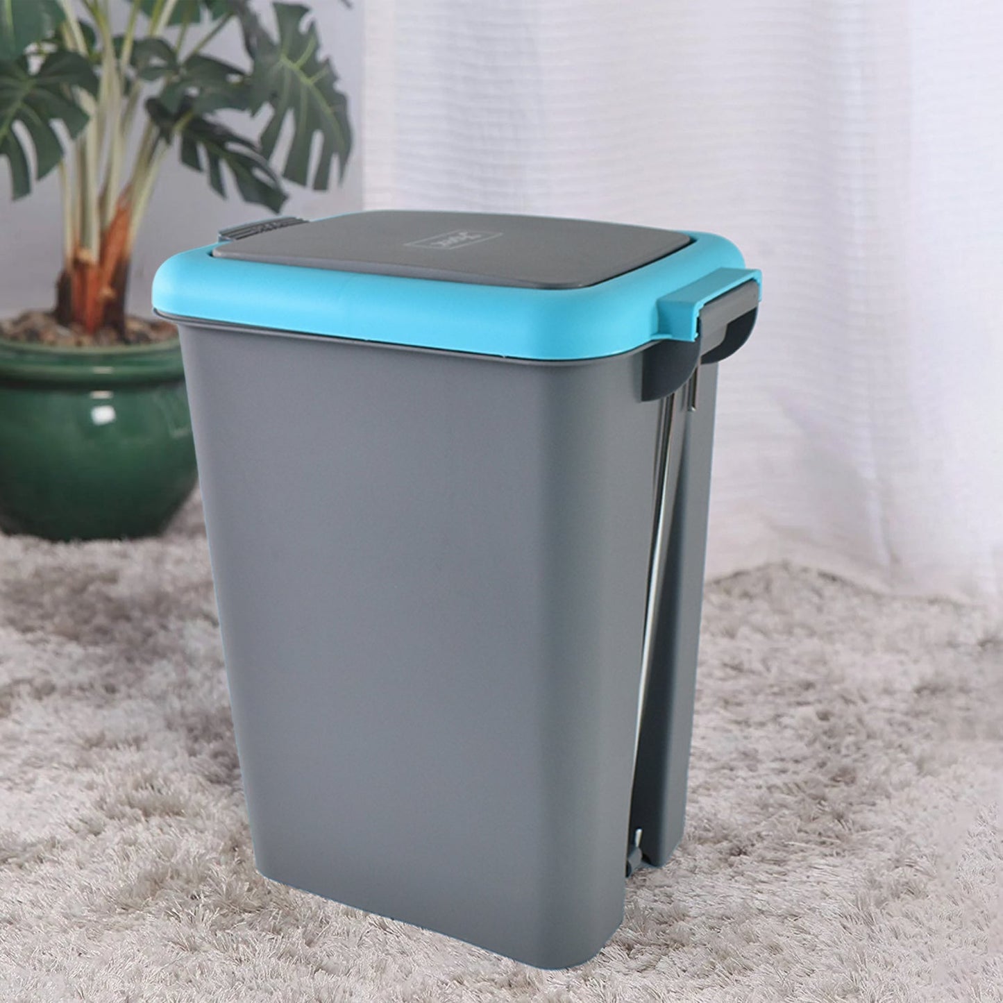 Close-up of Push N Pedal Dust Bin foot pedal mechanism for hands-free trash opening