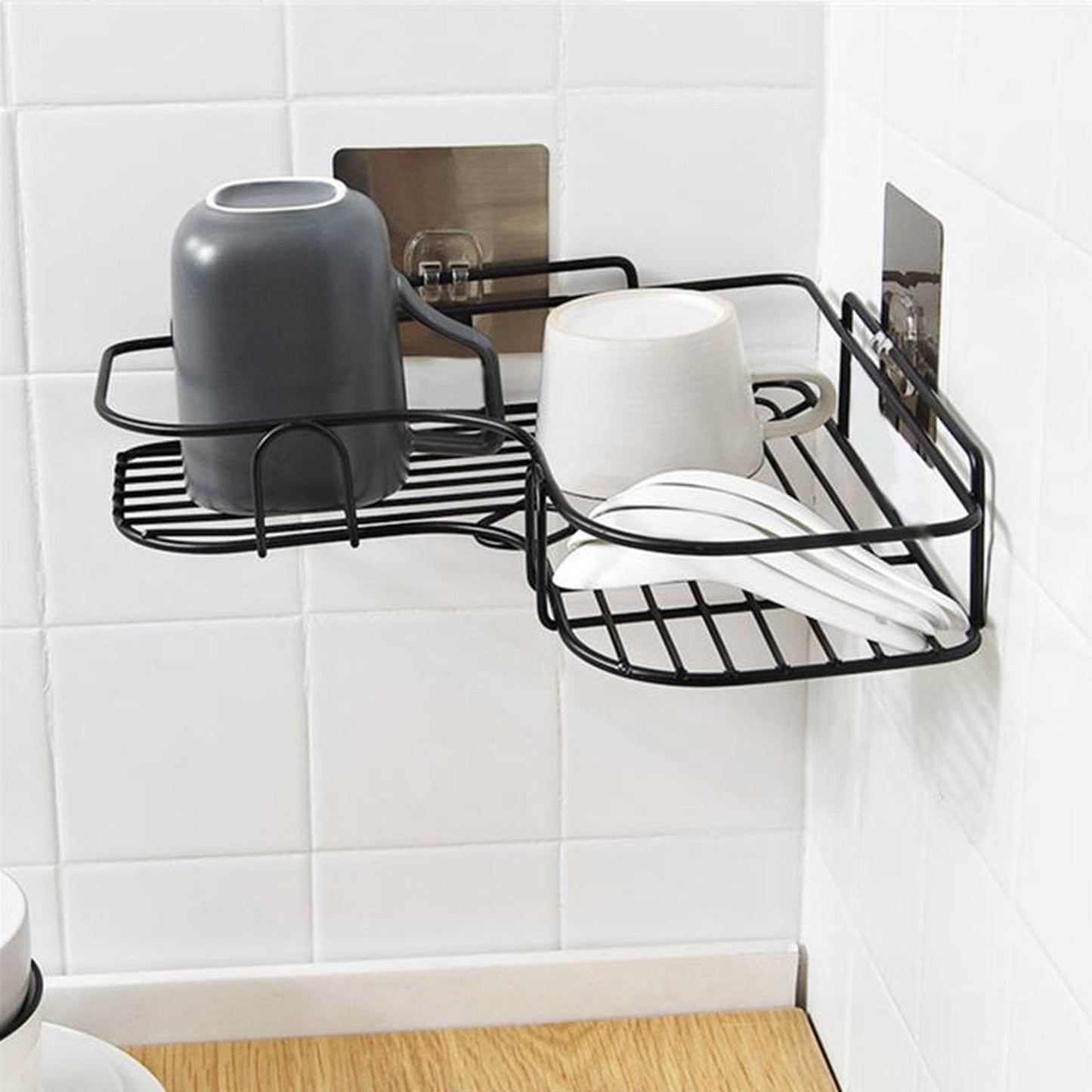 Stainless steel corner shelf organiser installed in a modern kitchen.