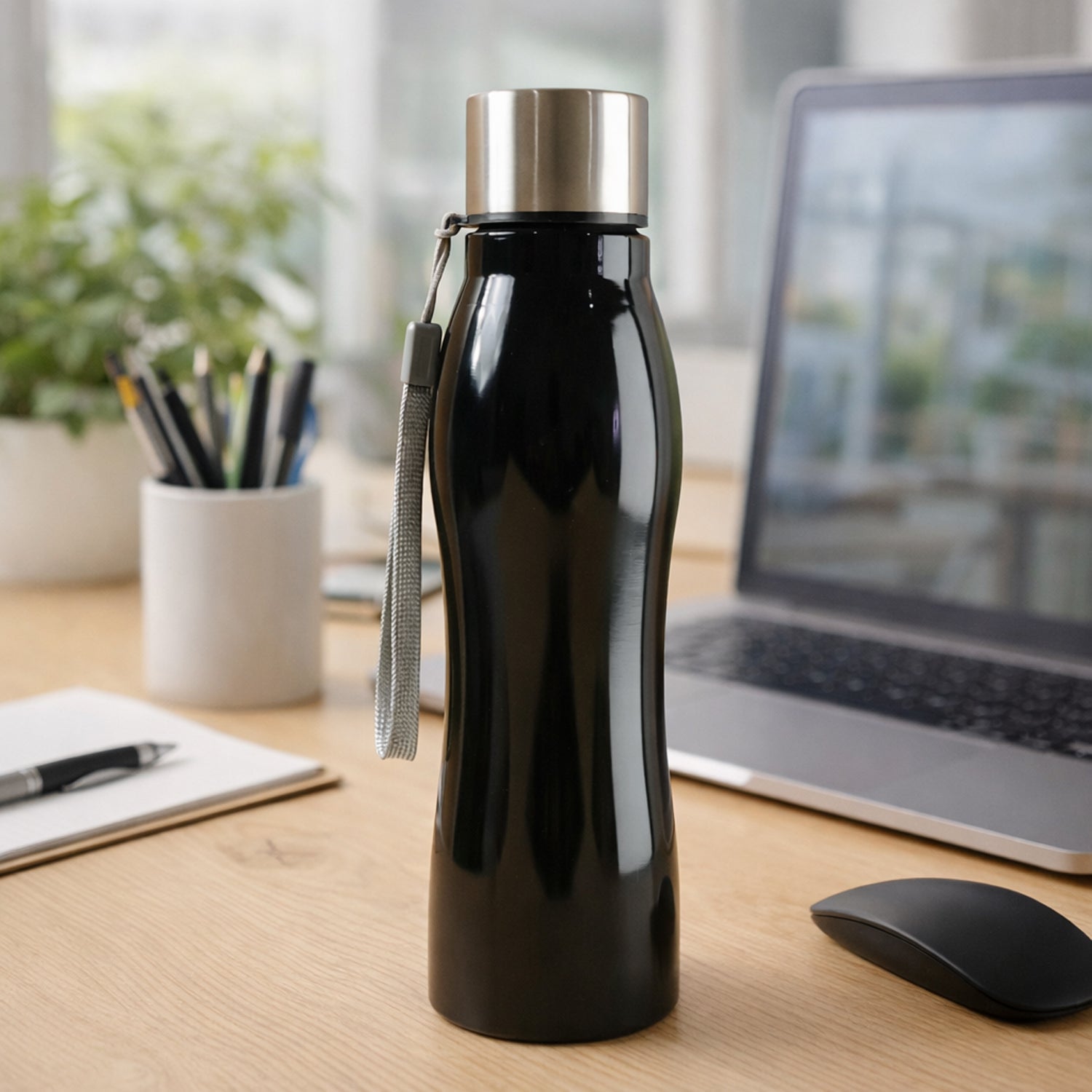 600ml stainless steel water bottle with carry strap on a clean background.