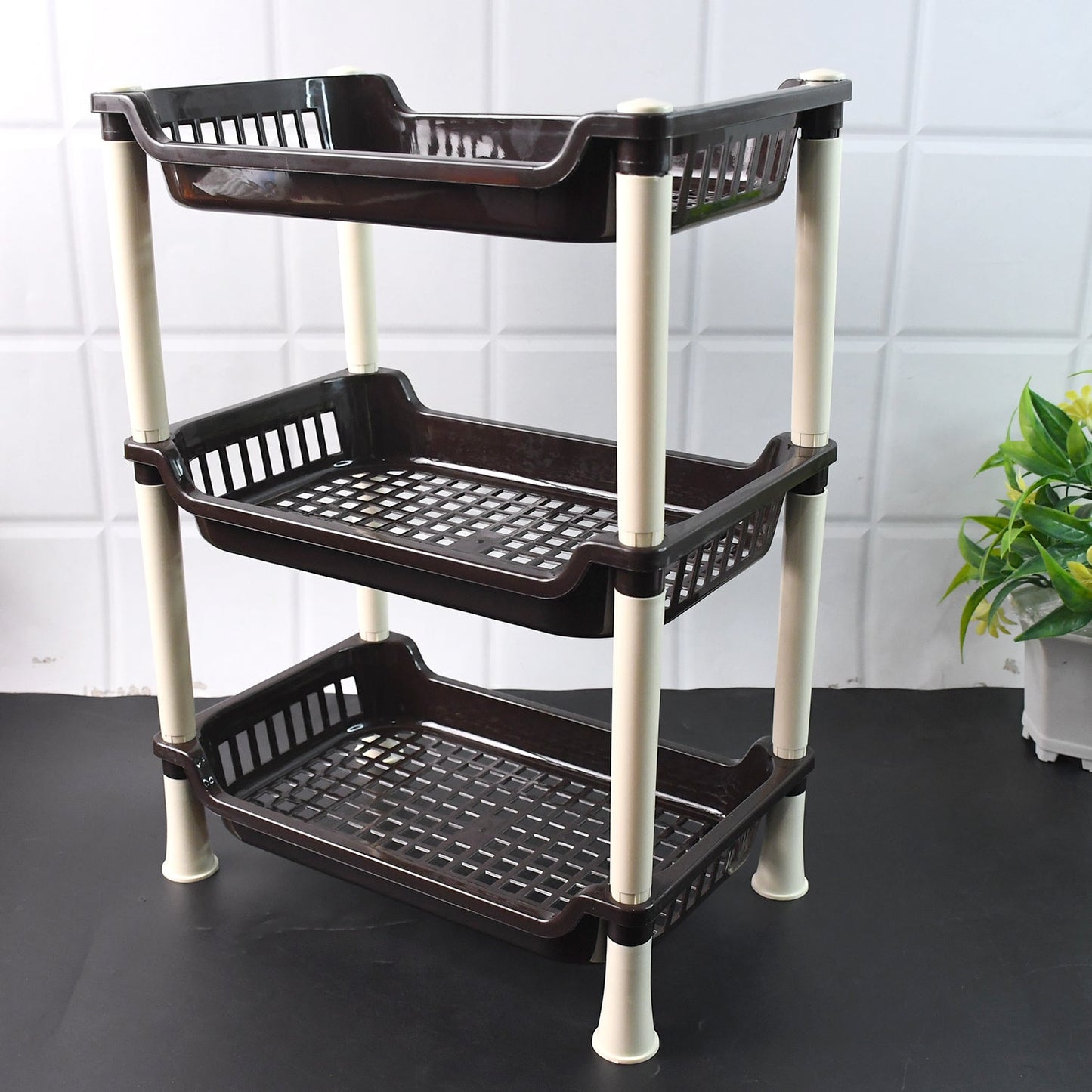 3-Tier Plastic Storage Rack Organizer in kitchen holding vegetables and crockery