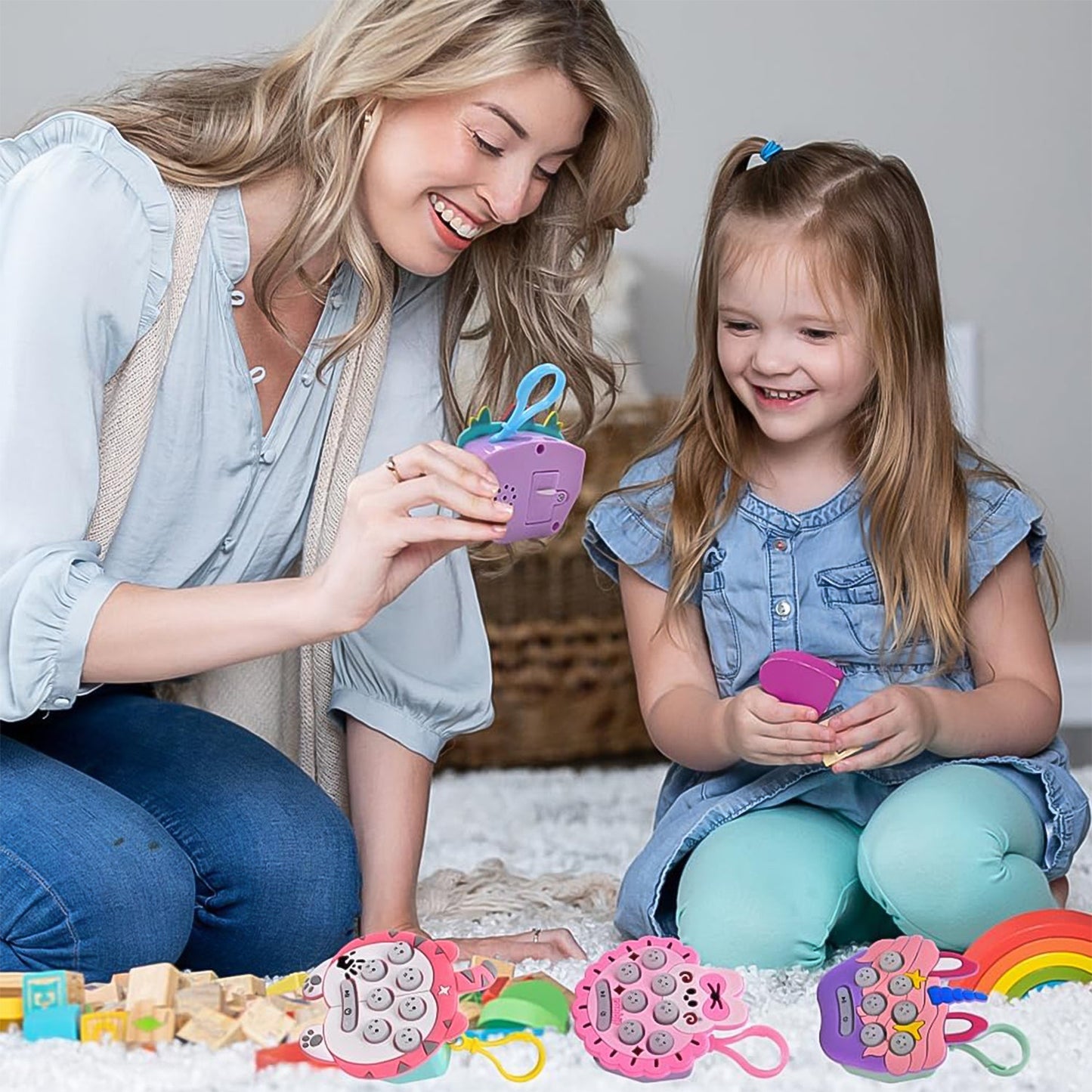 Mini Push Bubbles Game keychain attached to a backpack, ready for on-the-go play.