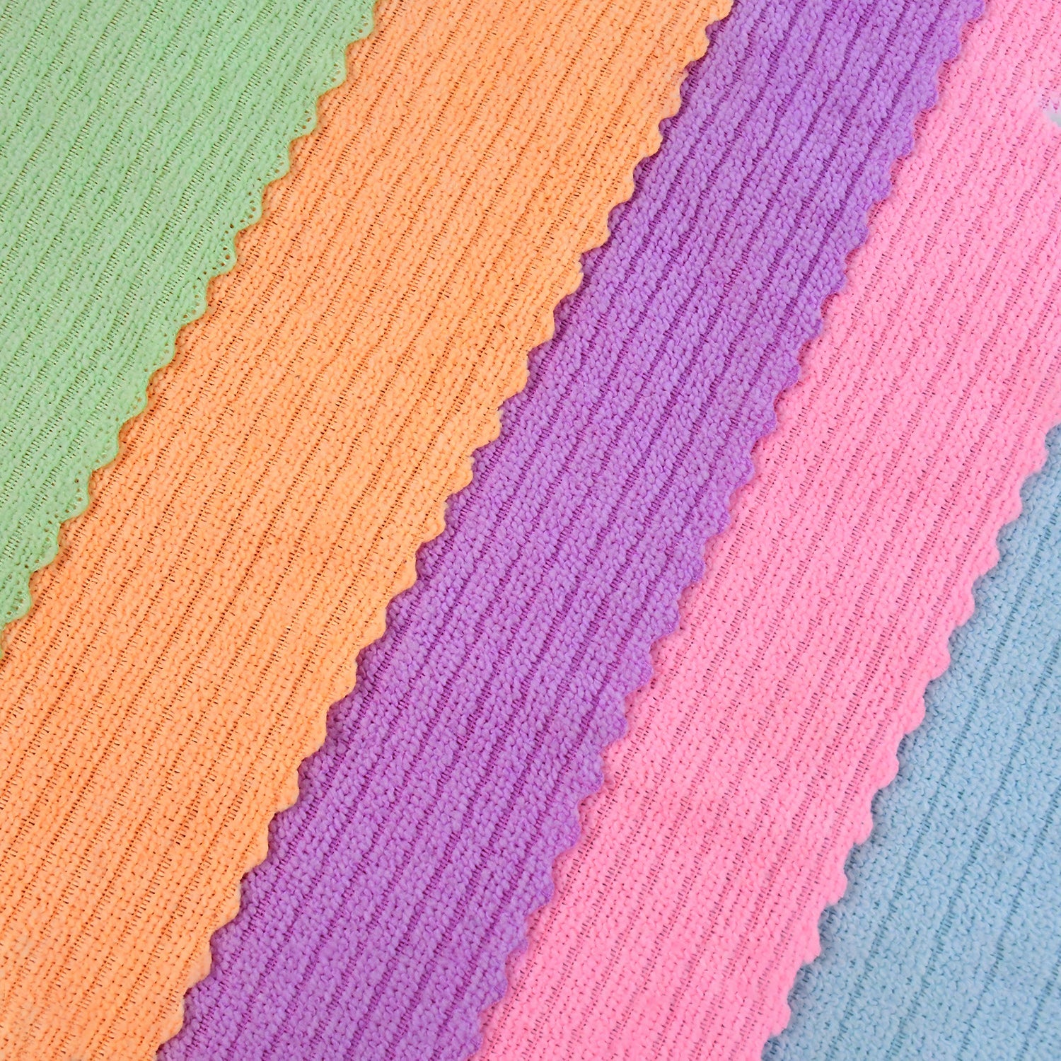 Close-up showing soft double coral fleece microfiber cloth texture