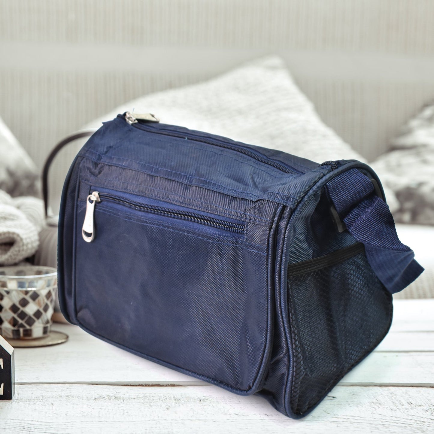 Side profile of the reusable insulated lunch bag, showcasing its compact yet roomy build.