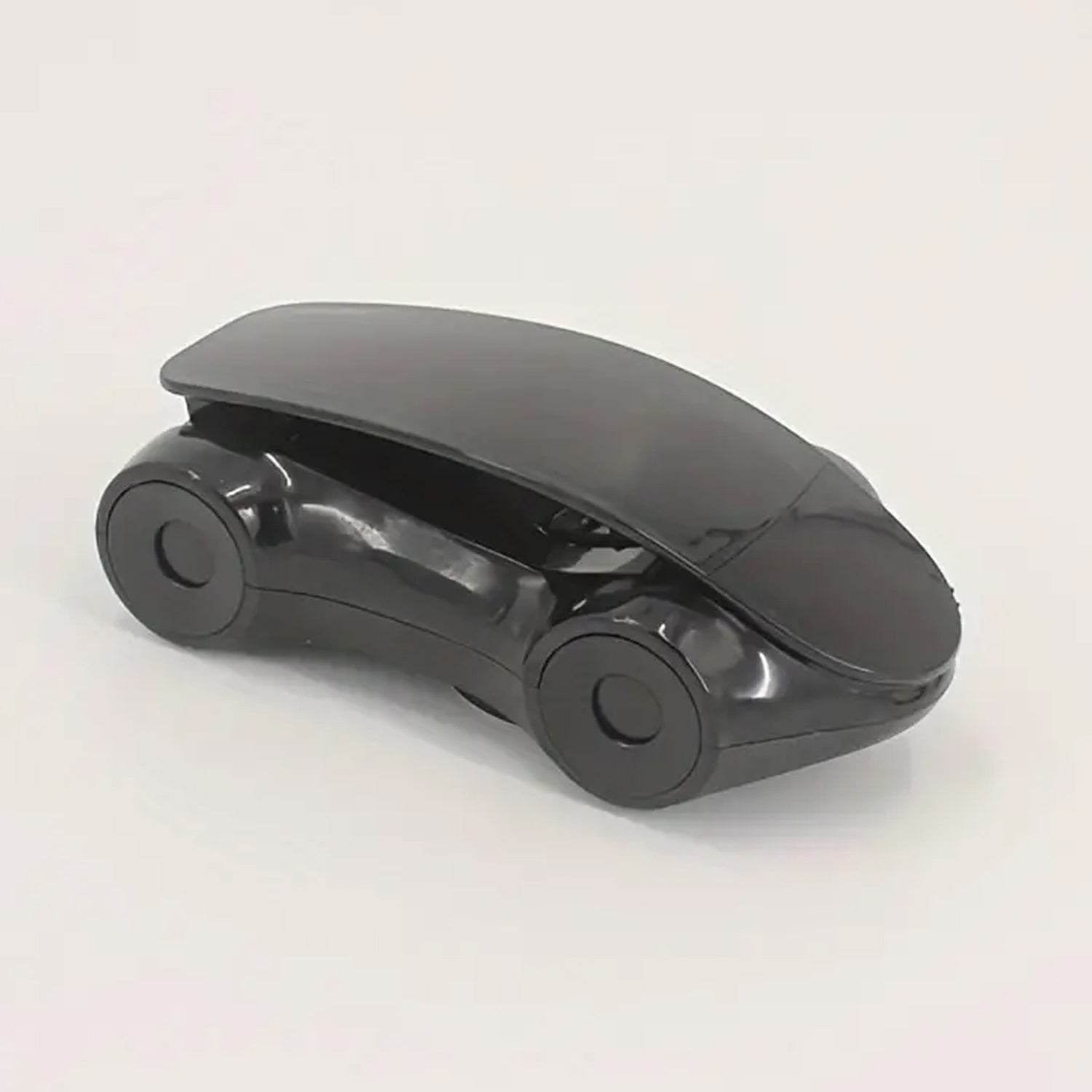 Stylish red sports car phone holder positioned on a car dashboard.
