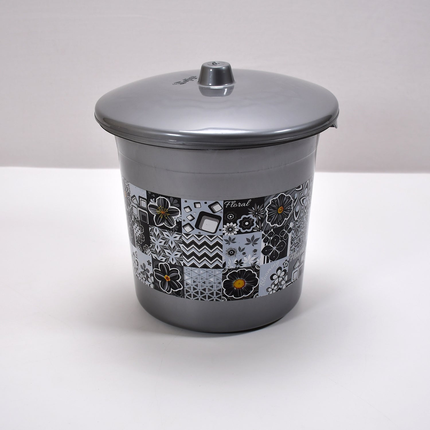 Detailed shot of the plastic bathroom accessories, emphasizing the quality and finish of the set.
