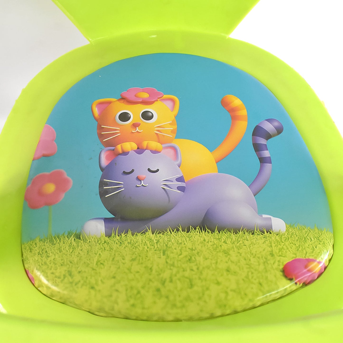 Stack of vibrant plastic chairs for kids, demonstrating the space-saving stackable design.