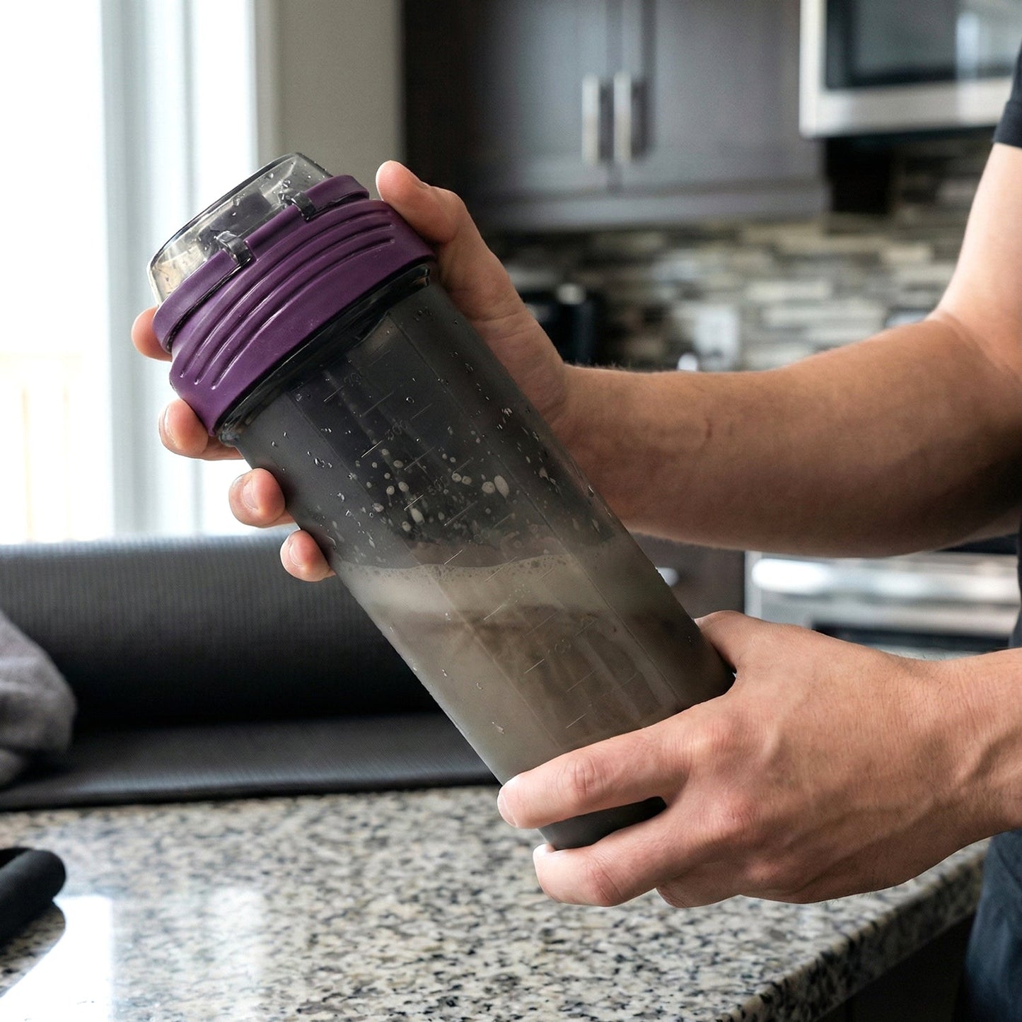 Protein shaker bottle featuring a screw-on cap for secure closure