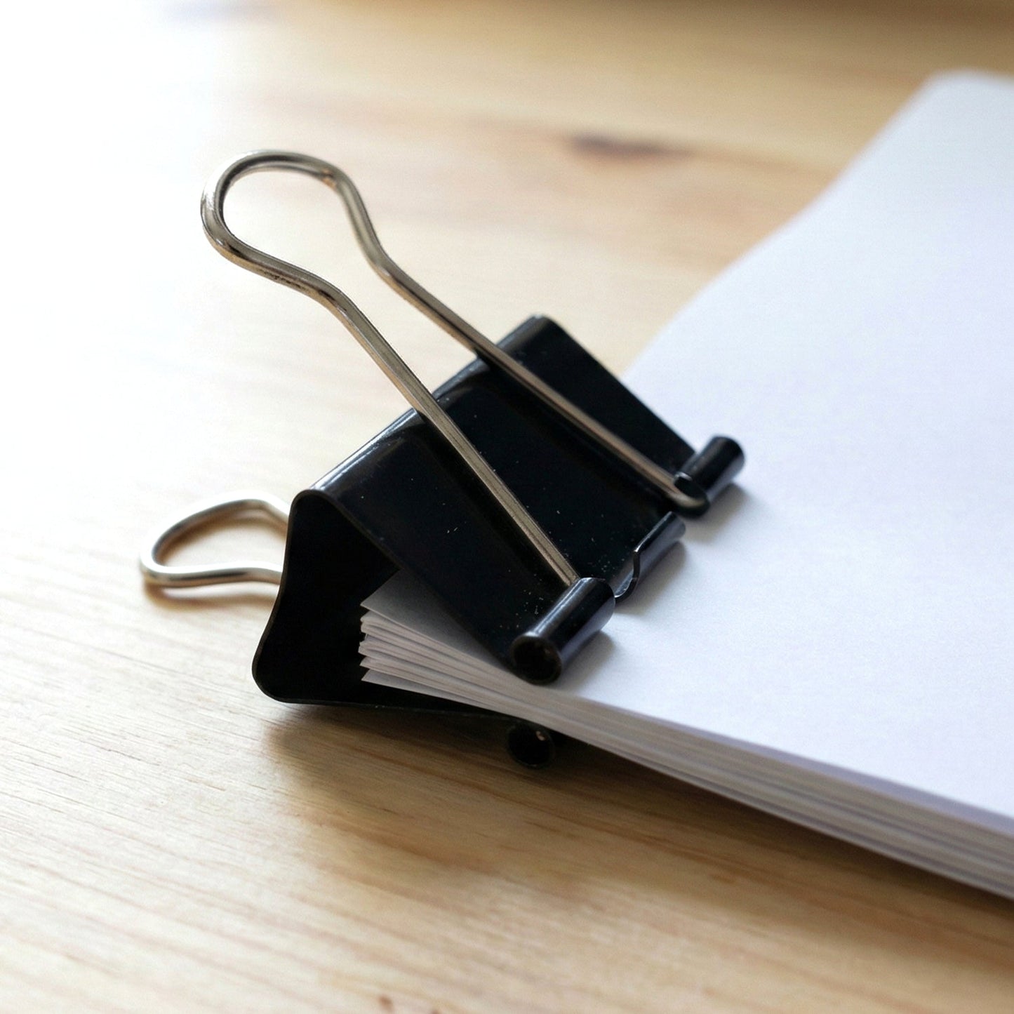 Sturdy office binder clips with rust-resistant black coating
