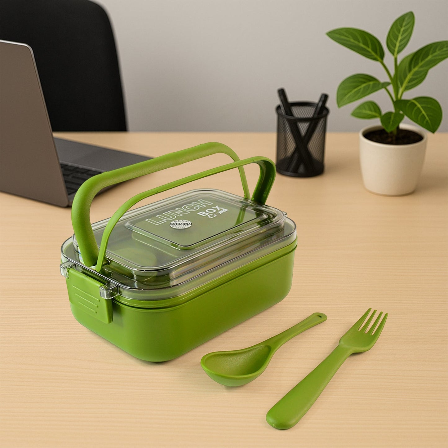 Top view of Magic lunch box with utensils stored inside the lid