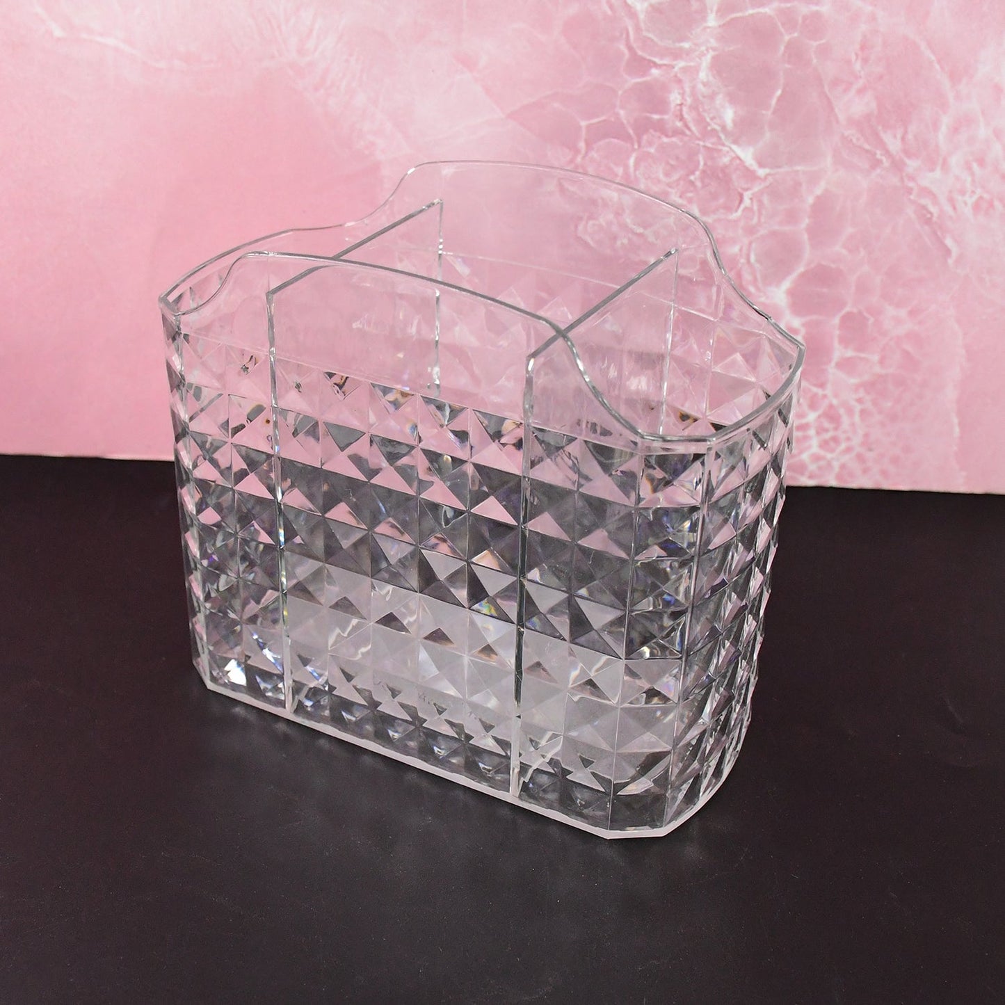 Multipurpose clear organizer holder with multiple compartments showing crystal texture