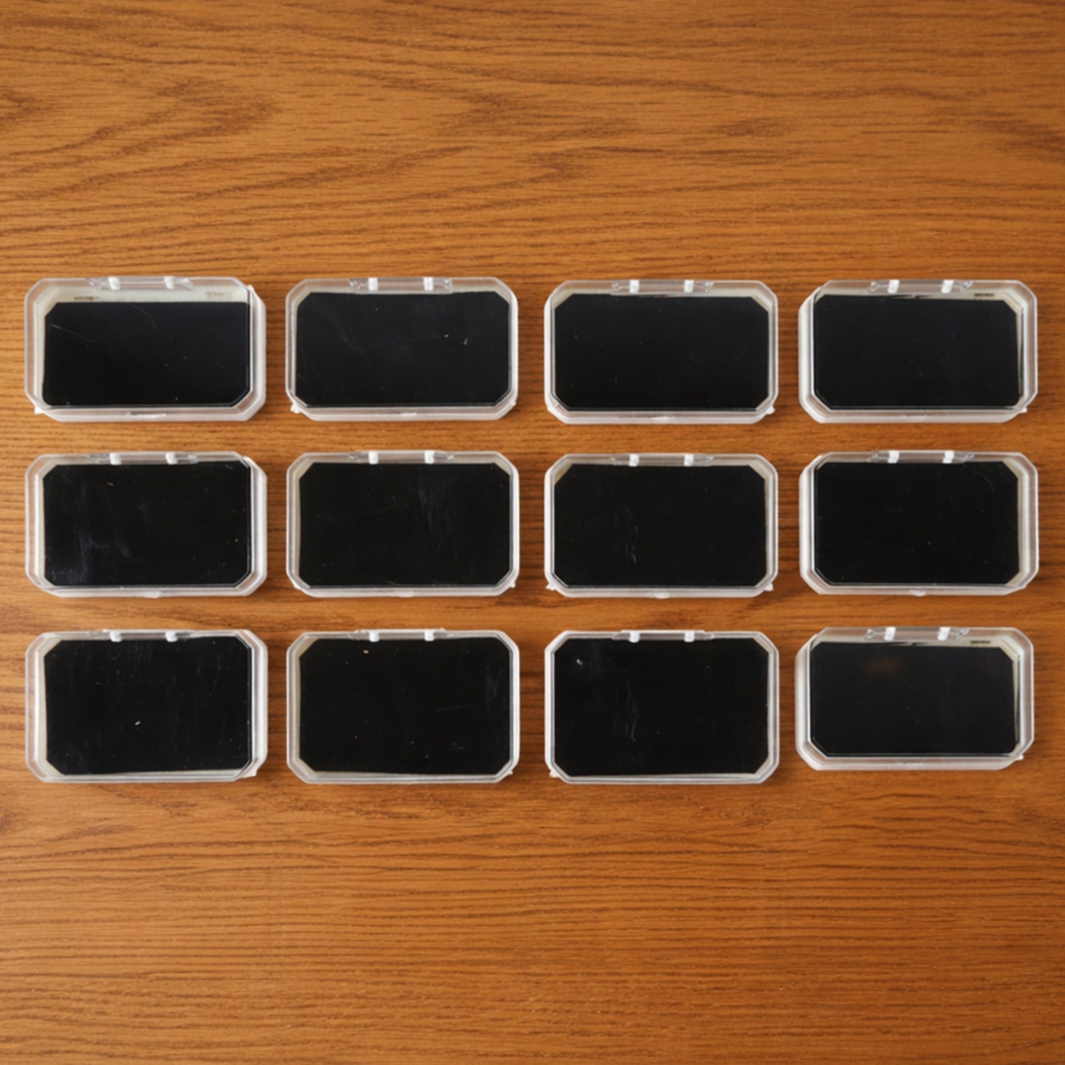 Twelve-piece rectangular jewellery storage box set with soft base for rings and earrings