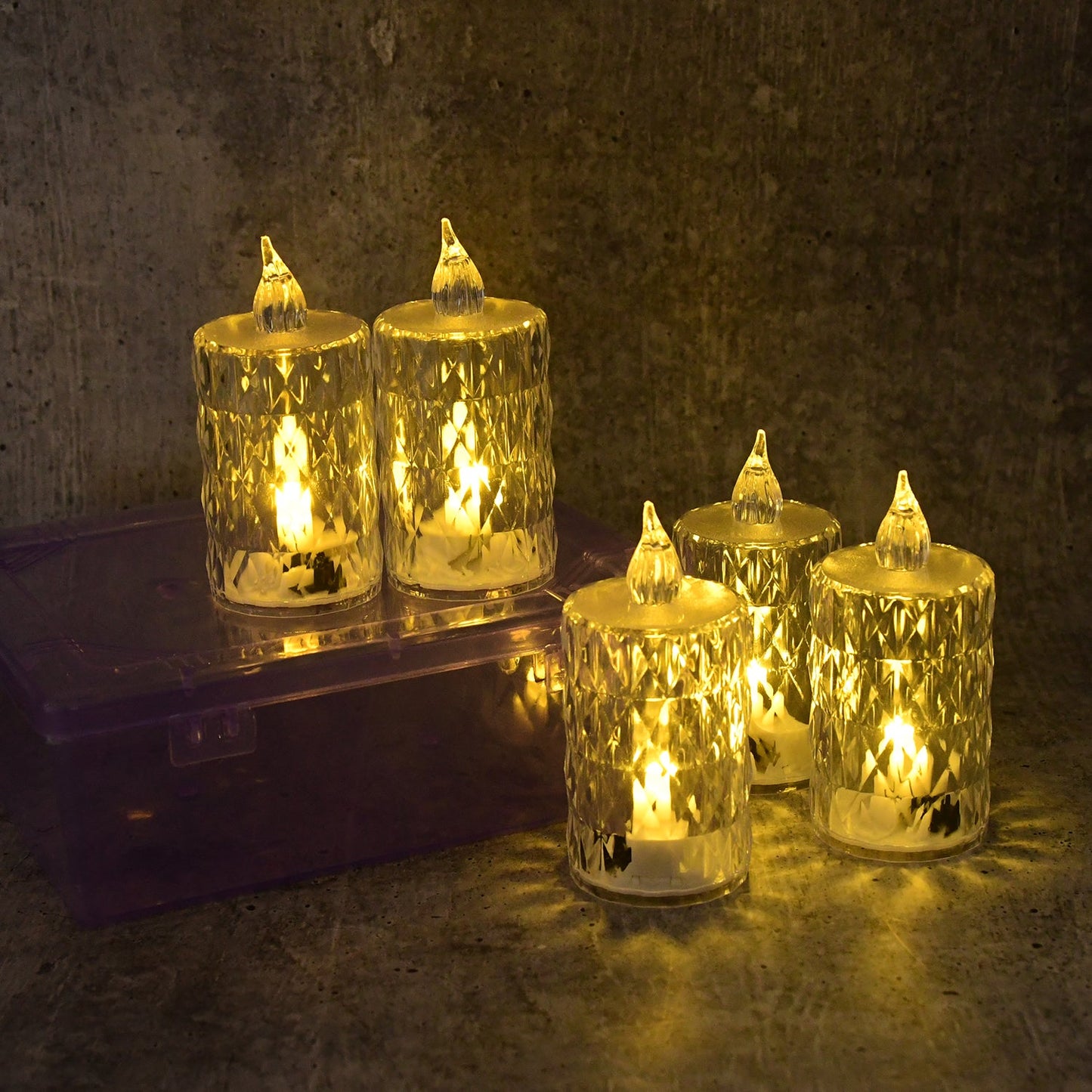 Closeup of LED crystal flameless candle highlighting diamond-cut glass