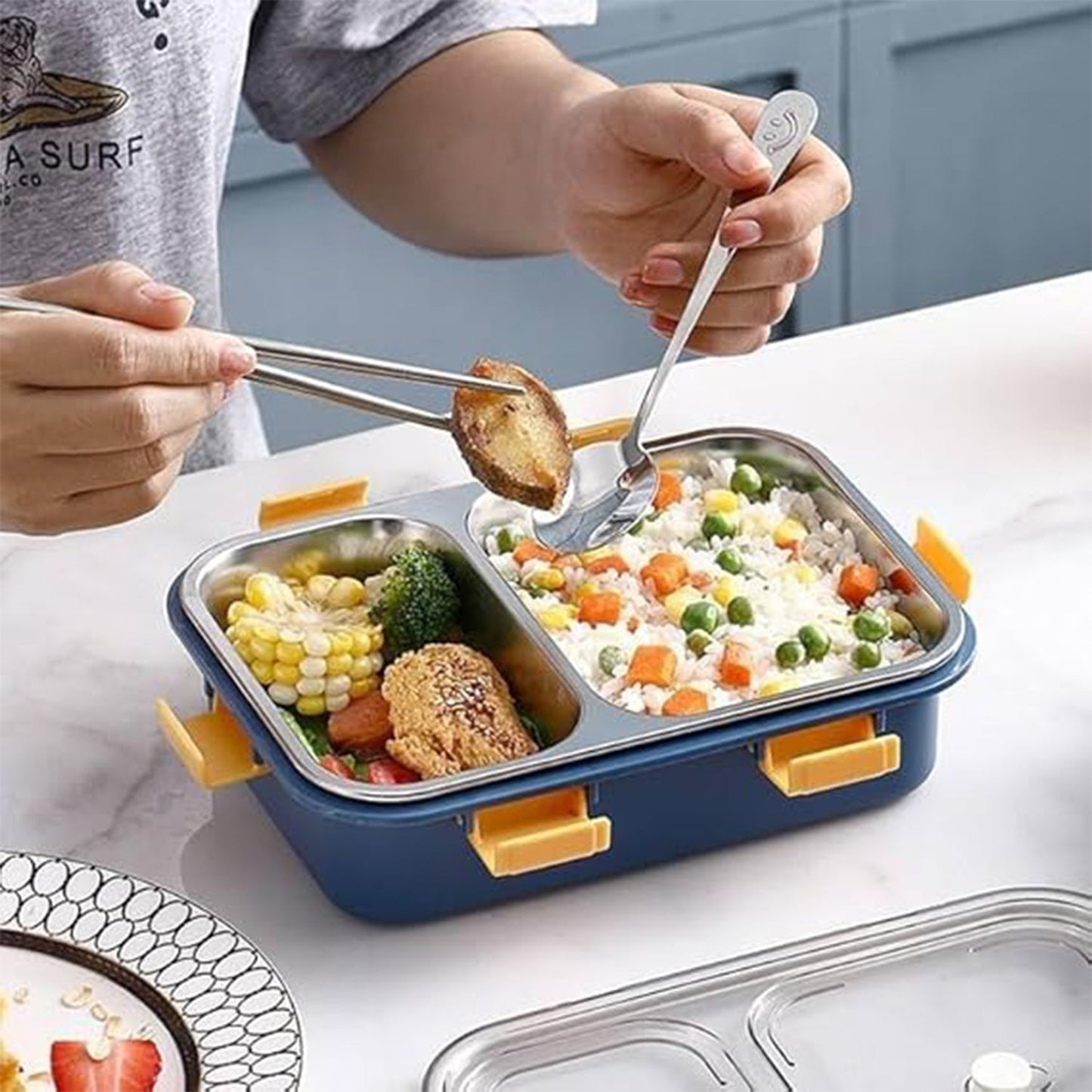 Closed stainless steel lunch box with secure locking lid