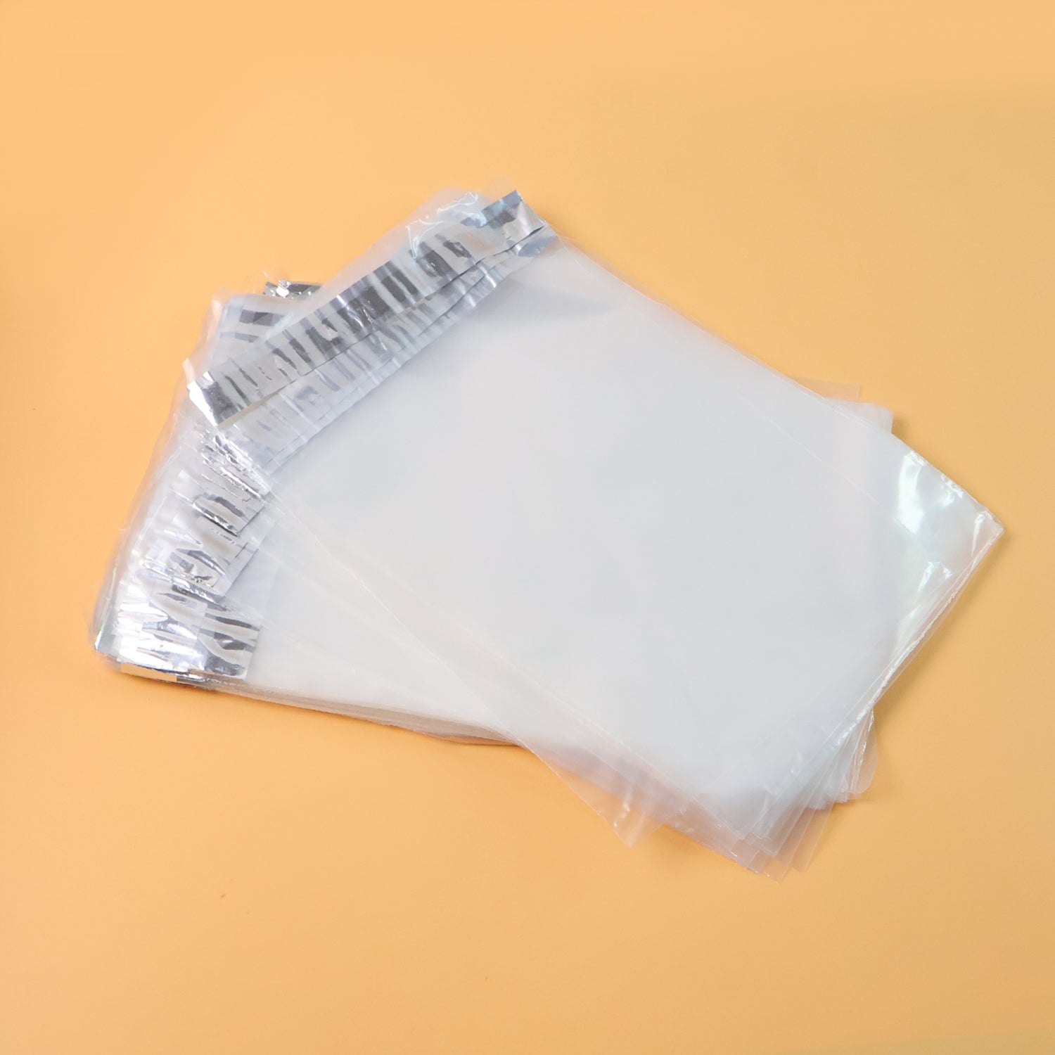 Self-adhesive transparent courier polybag showcasing secure packaging