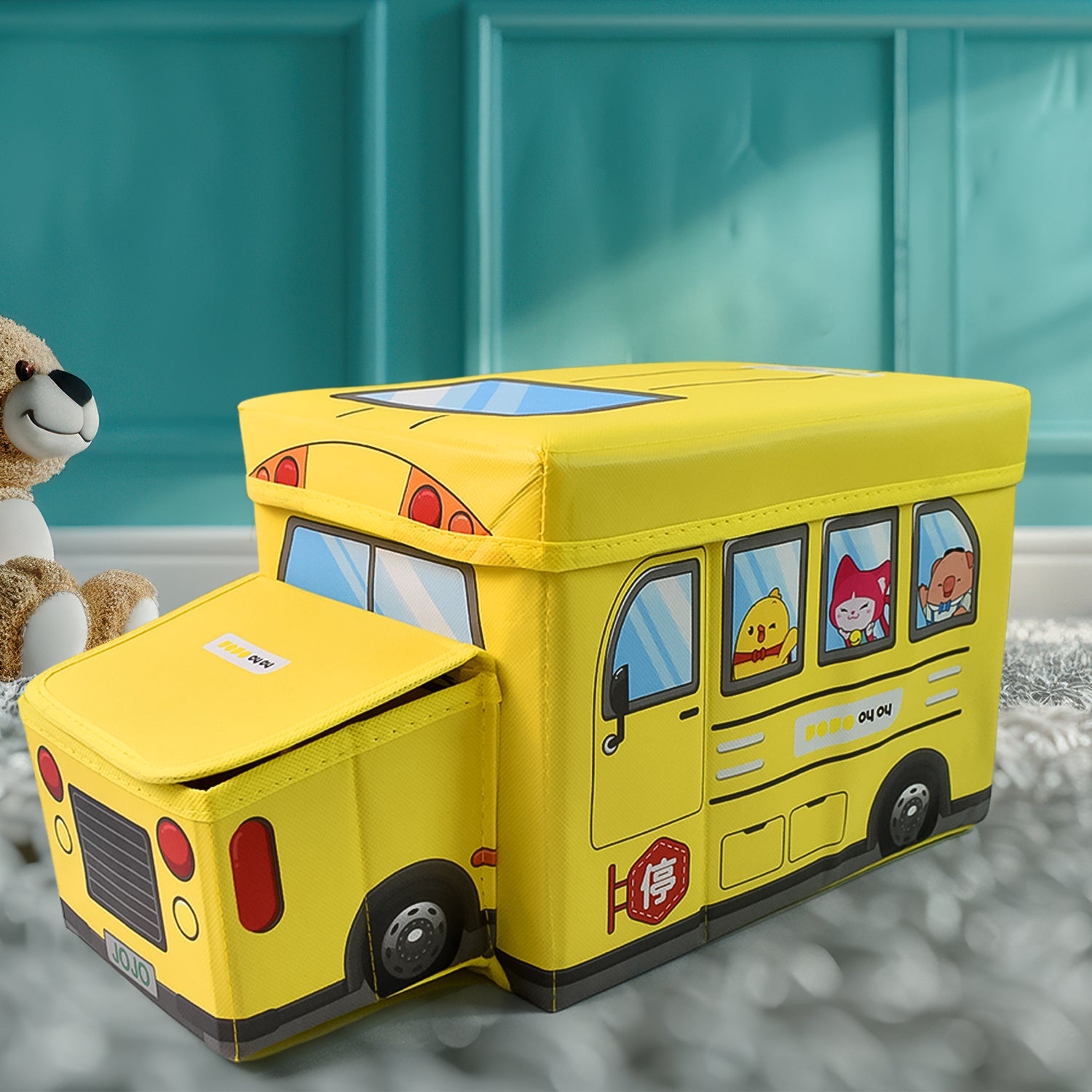 The School Bus Toy Storage Box demonstrating its easy-to-fold design for convenient storage.