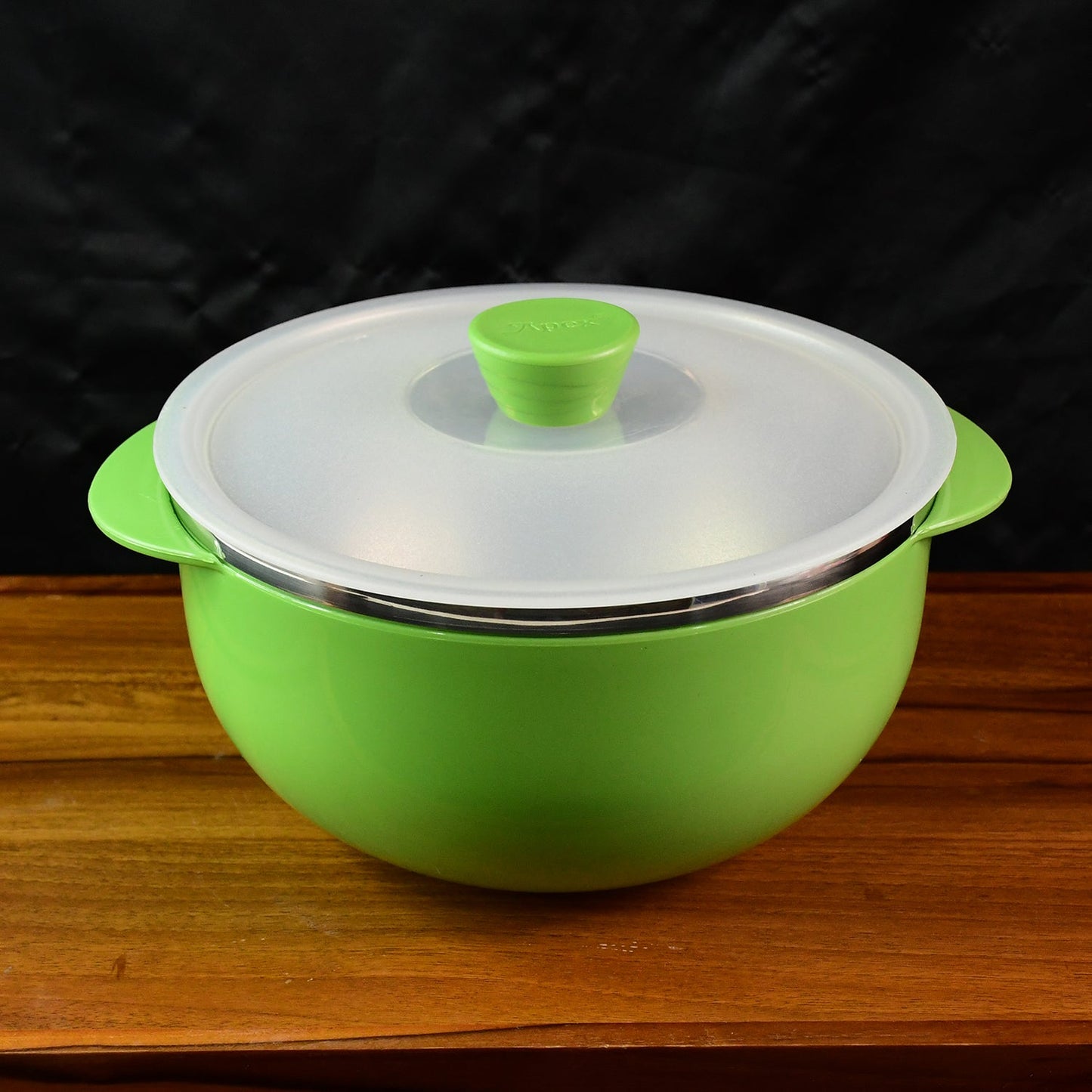 Ergonomic serving bowl with side handles and vented plastic lid