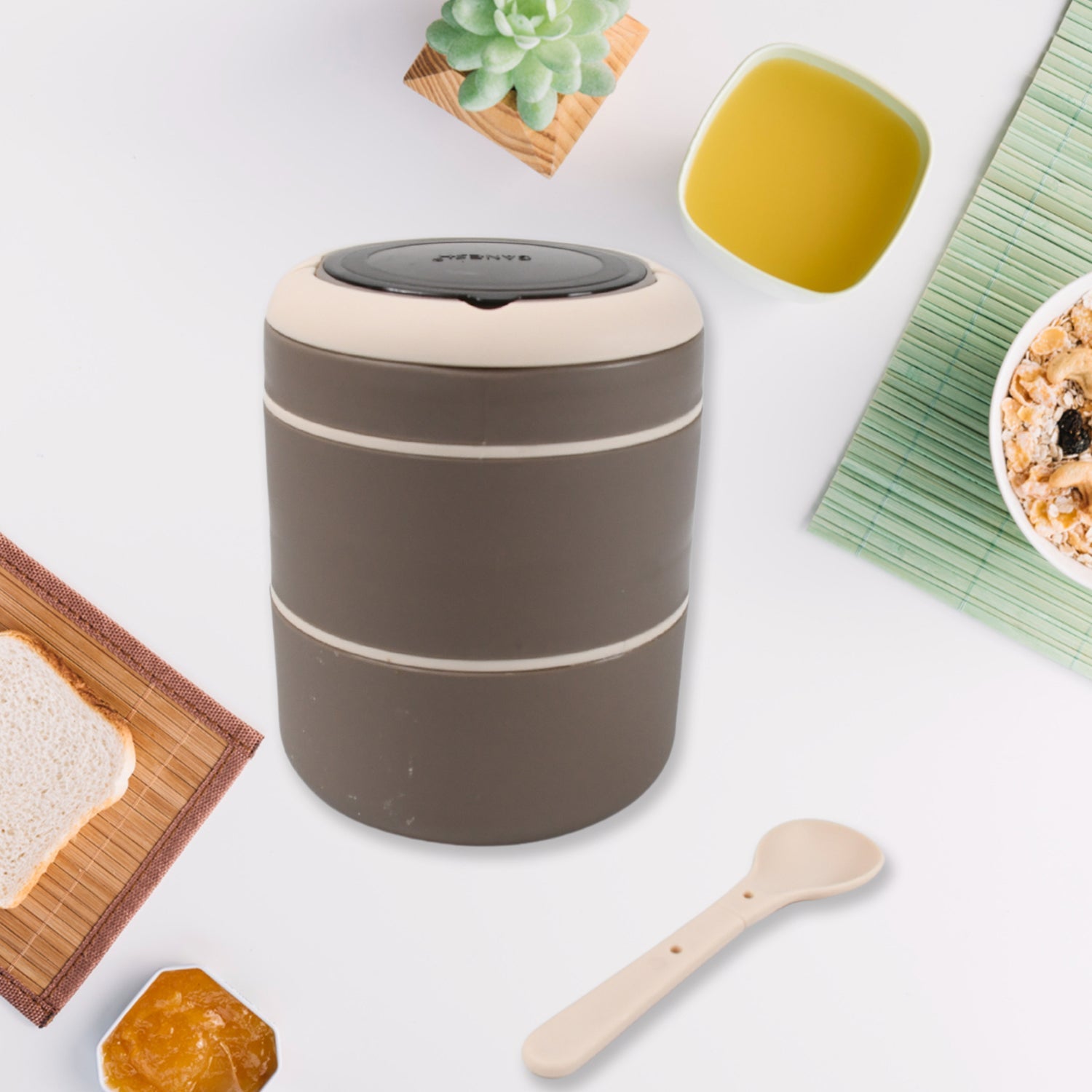 A vibrant 2-layer Ganesh stainless steel lunch box, perfect for daily meals.