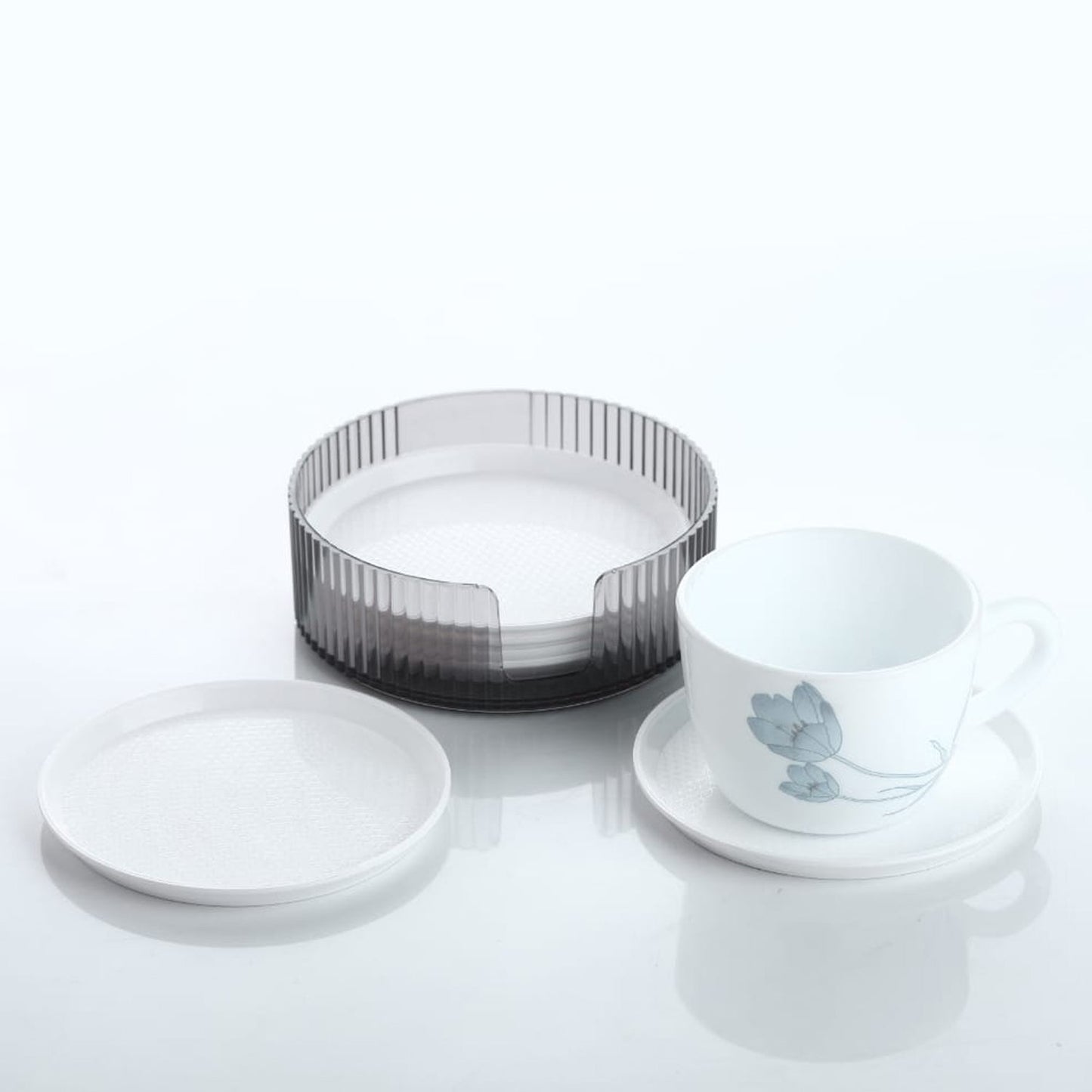 Durable plastic coasters effectively protecting a wooden surface from drink stains.