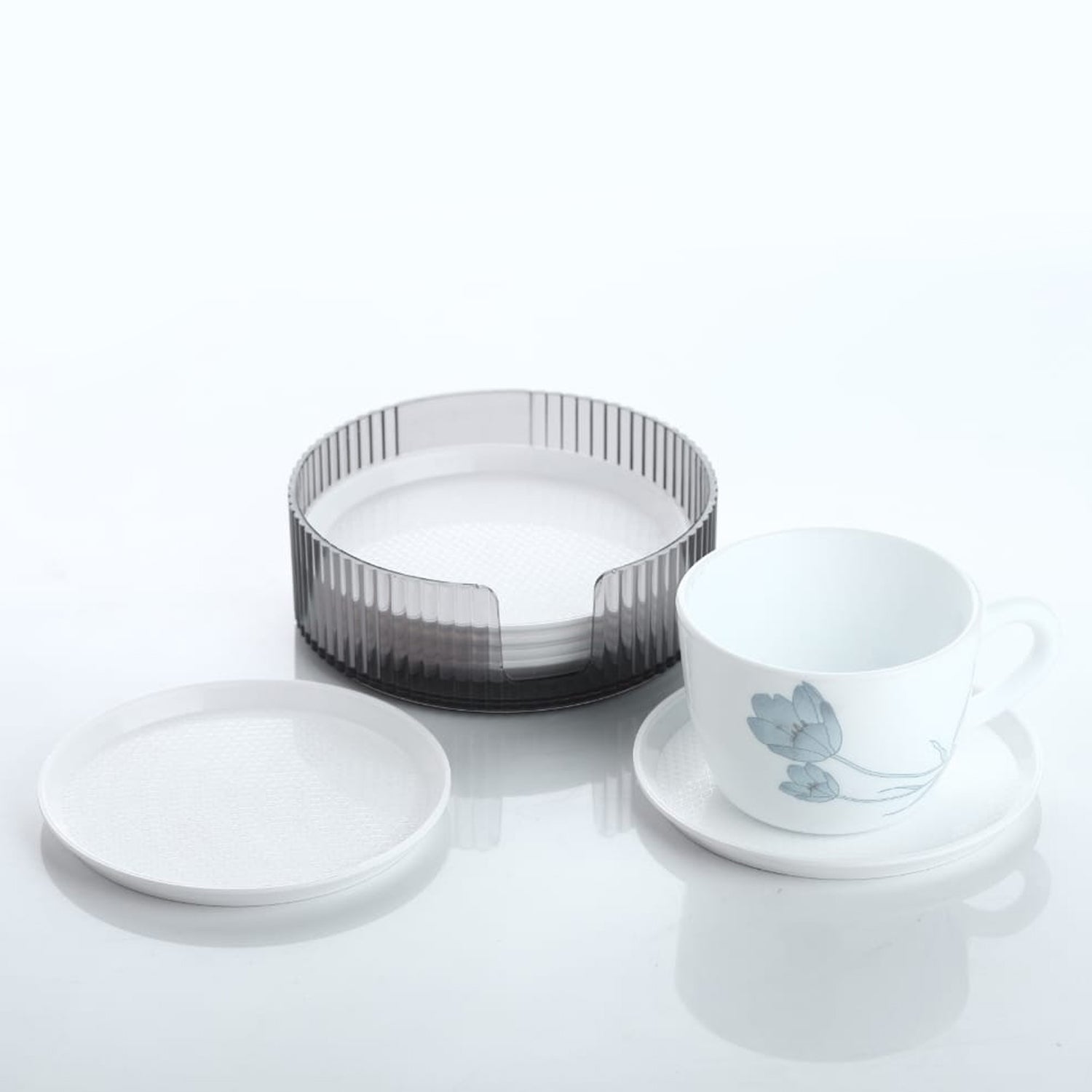 Durable plastic coasters effectively protecting a wooden surface from drink stains.