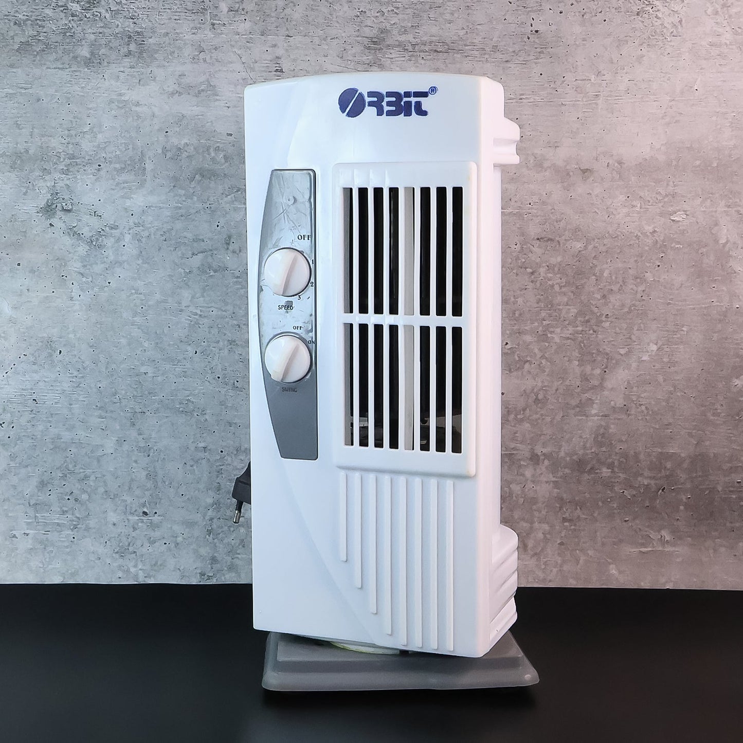 Side angle view of Orbit micro oscillating tower fan fan