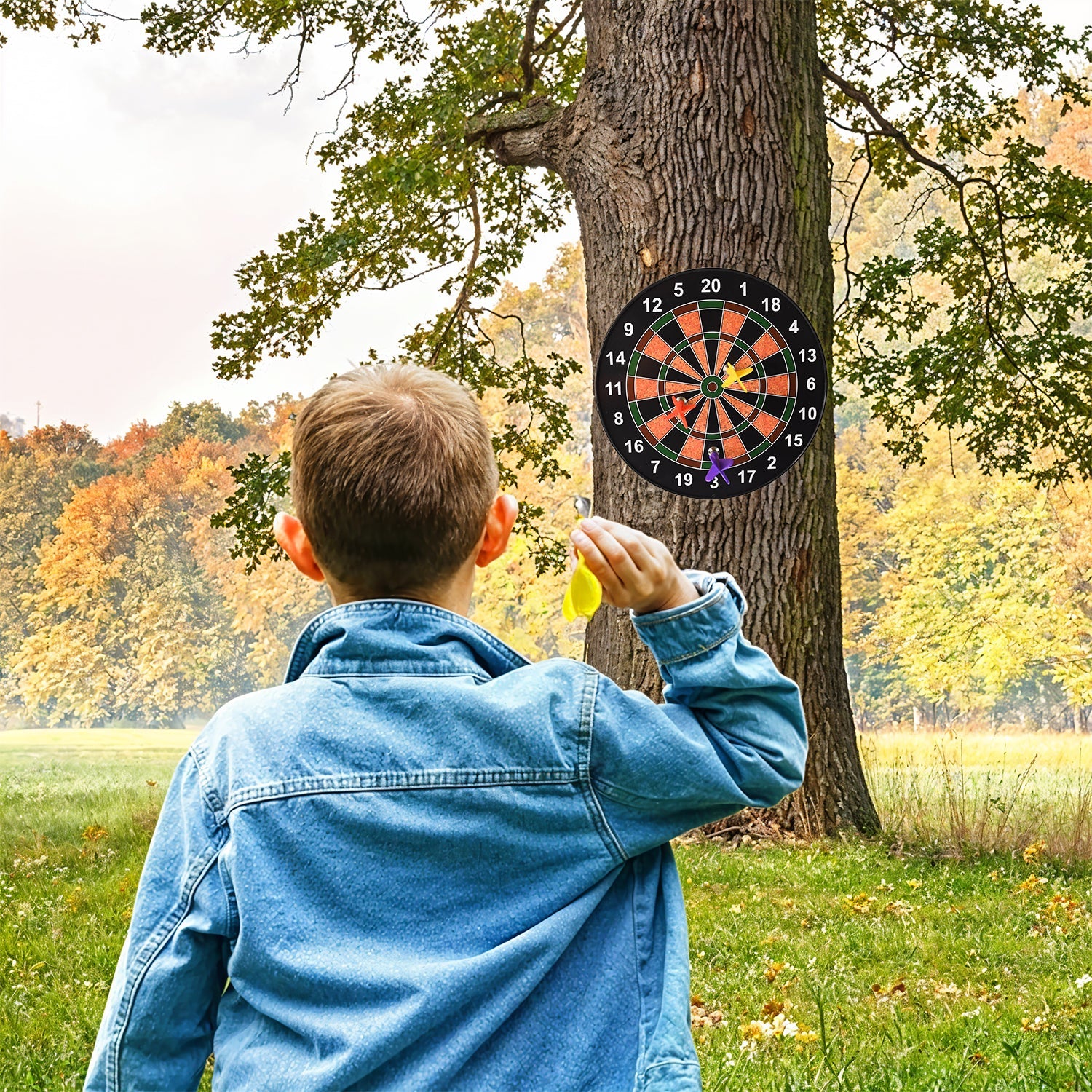 Close-up of three colorful magnetic darts in red, yellow, and purple
