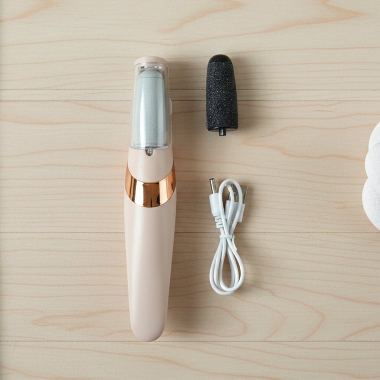 Side view of the portable Flewless Pedi electronic pedicure device, perfect for travel.