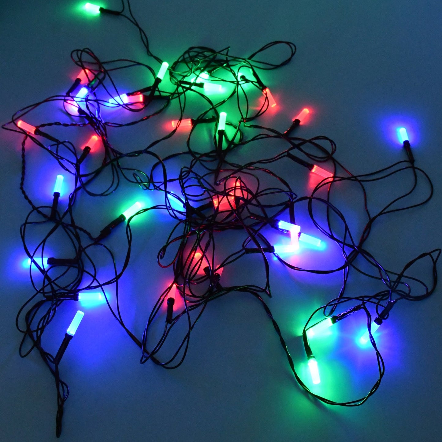 9 Meter Multi-Color LED Decorative String Lights illuminating vibrant colors indoors