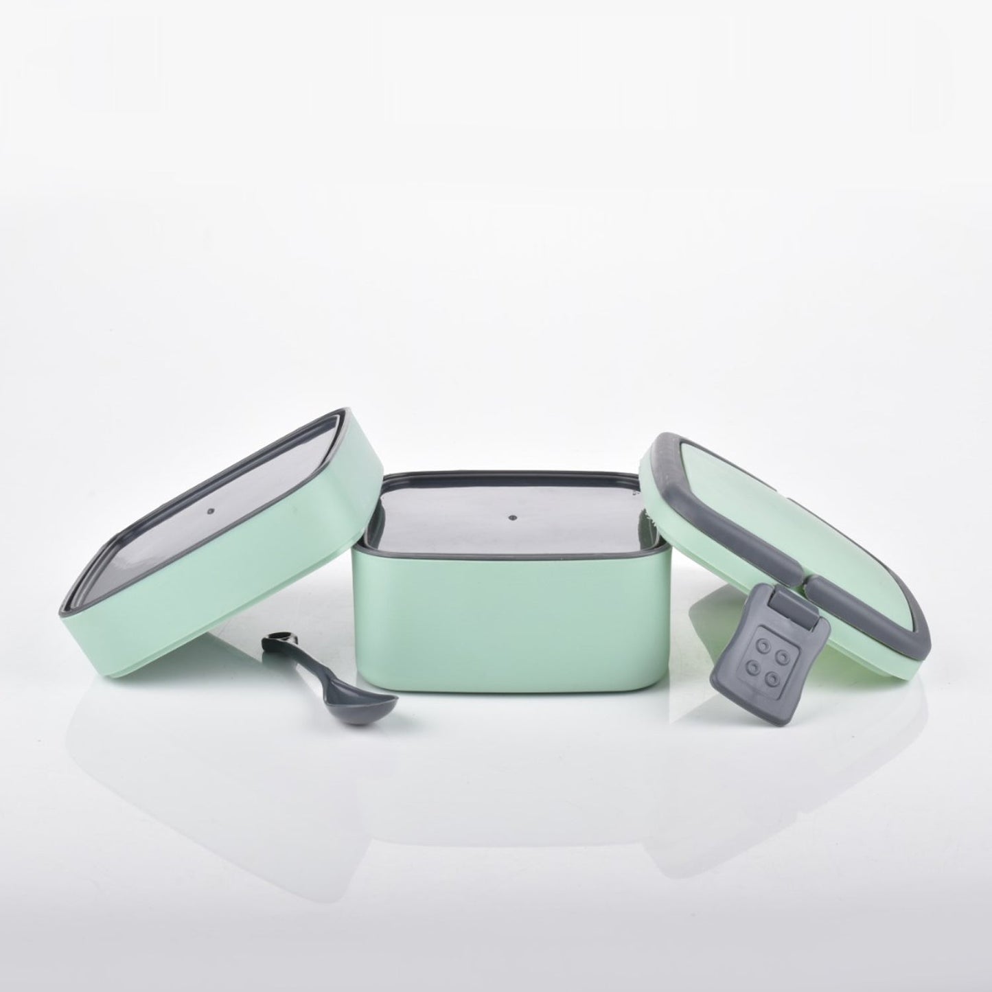 Compact green stackable lunch box, ideal for school or office.