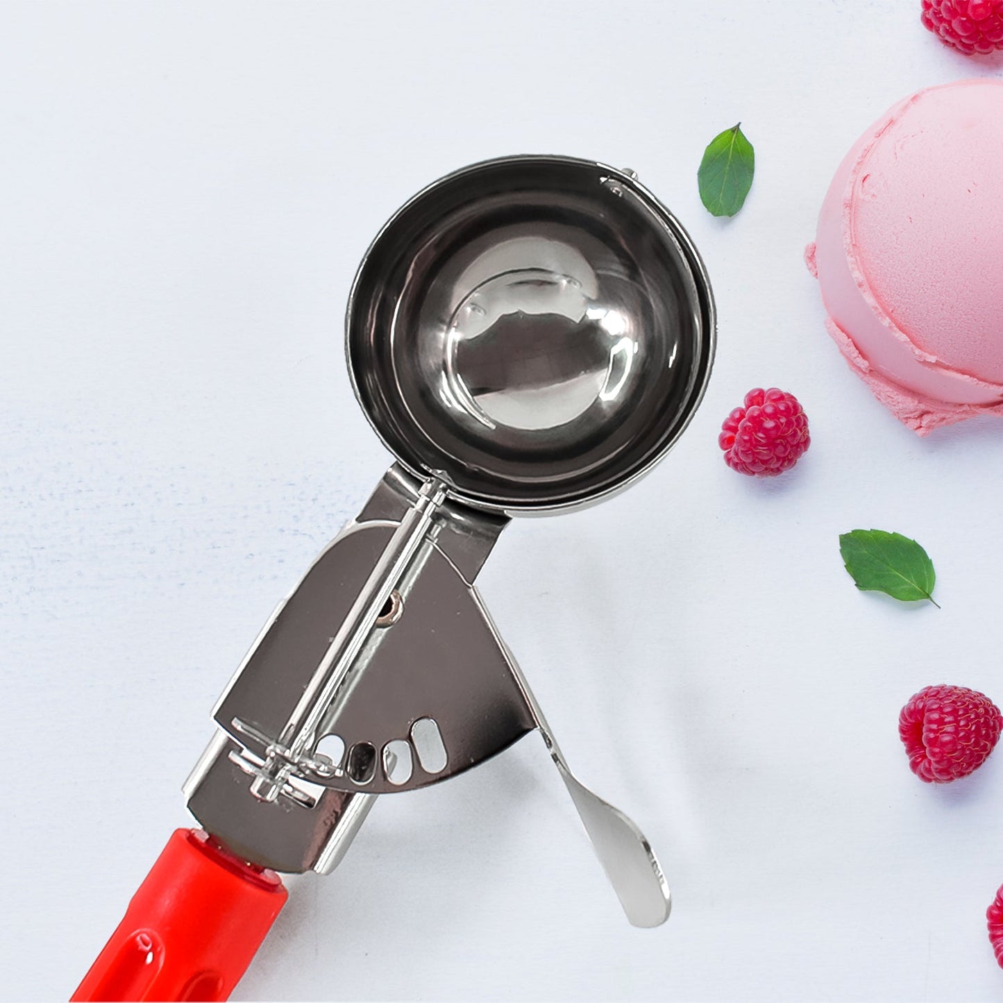 Quick-release lever ice cream scoop for clean dessert portions
