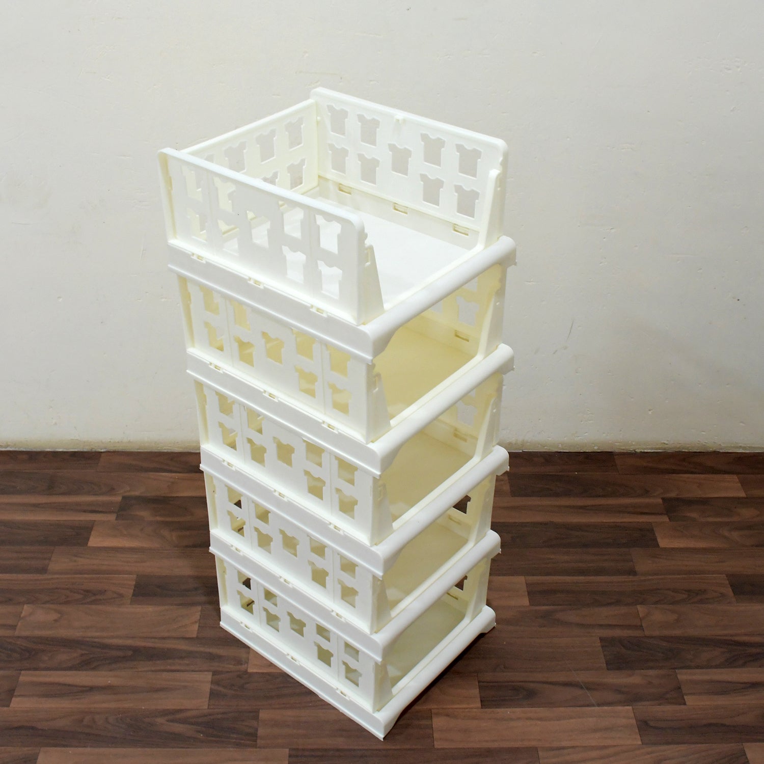 Compact 5-layer foldable storage cart, ideal for small spaces like a closet.