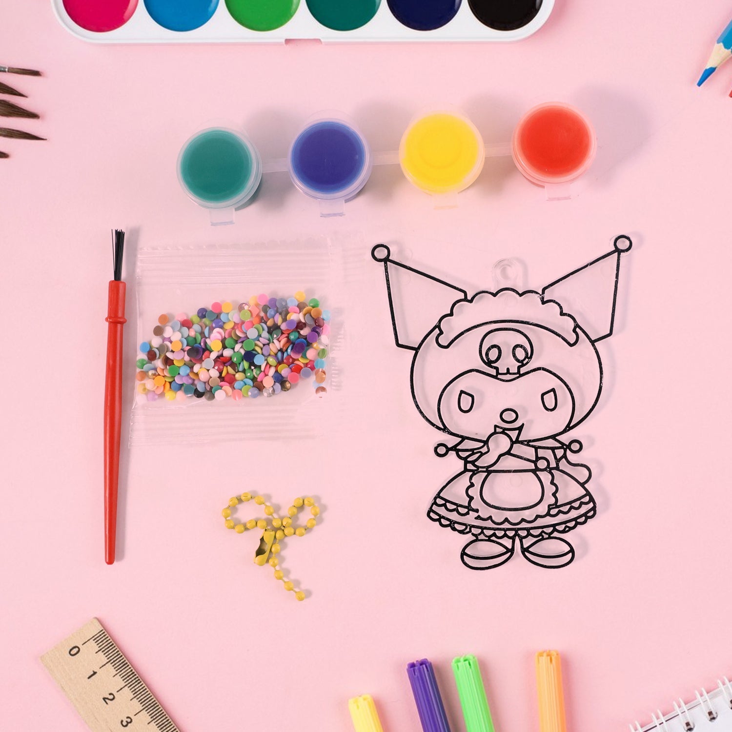 Creative coloring set for kids featuring mini paint pots and brush