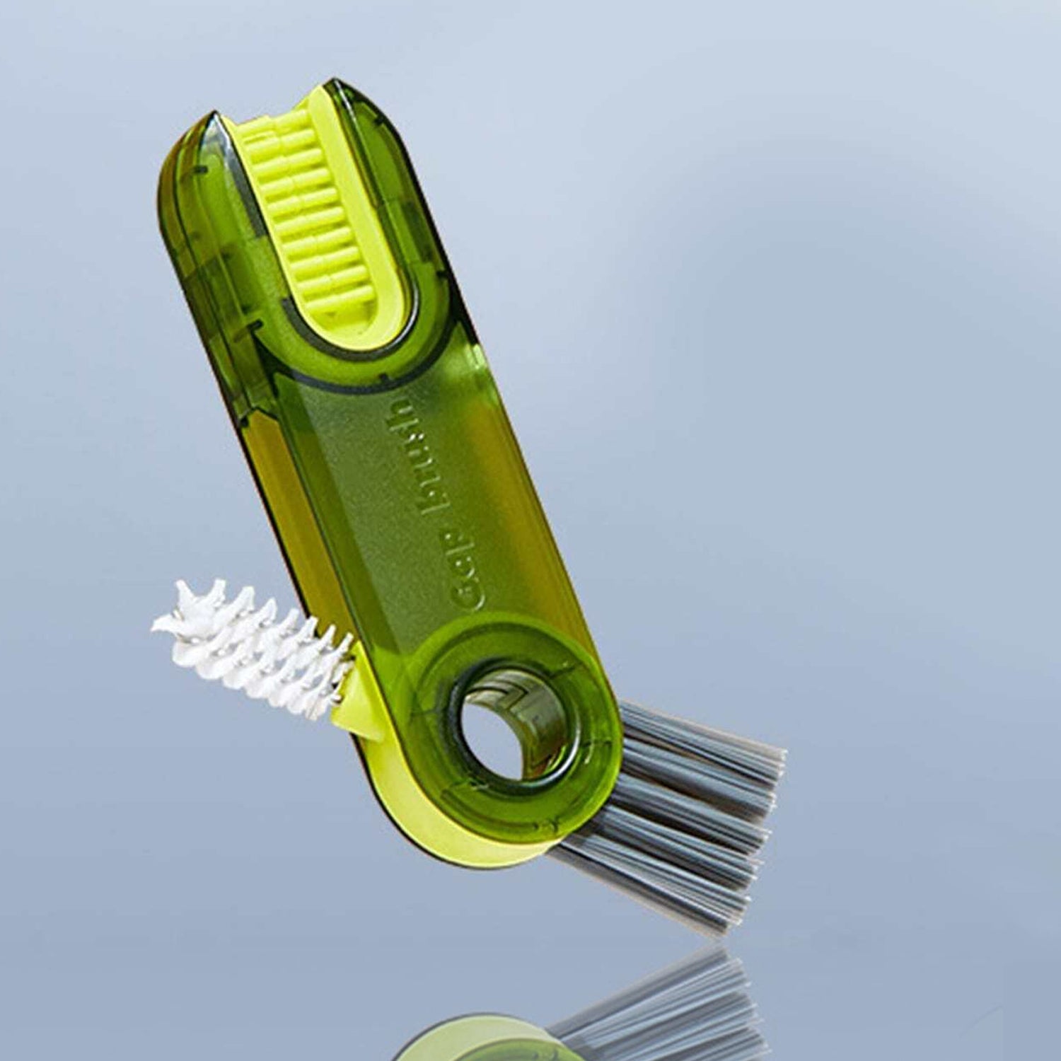Close-up of the bottle cleaning brush highlighting its three distinct cleaning heads.