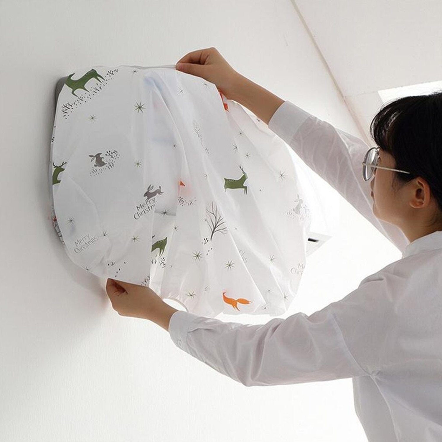 Elegant indoor AC unit cover with a vibrant print, protecting from dust.