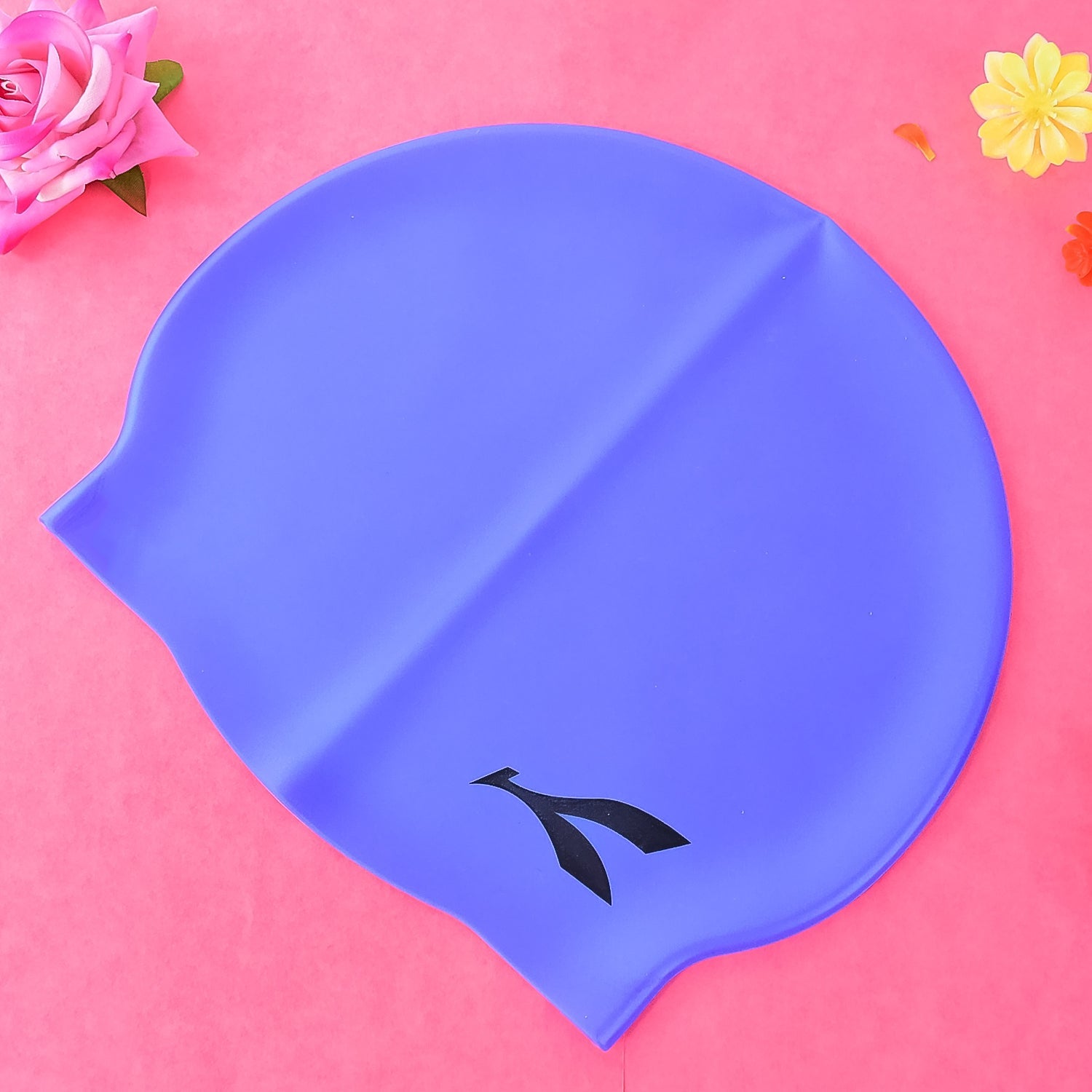 Junior wave silicone swimming cap designed for comfortable, secure fit during swim sessions