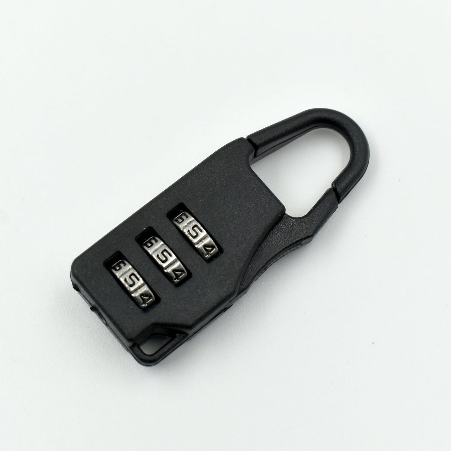 A sleek black 3-digit luggage lock securely attached to a suitcase zipper.