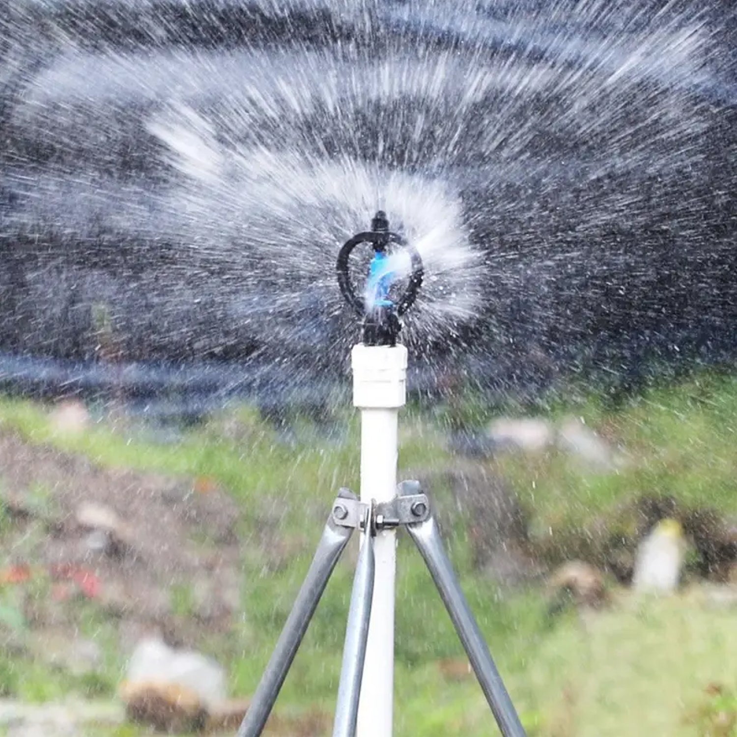 Angled view of the rotating garden spray nozzle, highlighting its broad coverage capability.