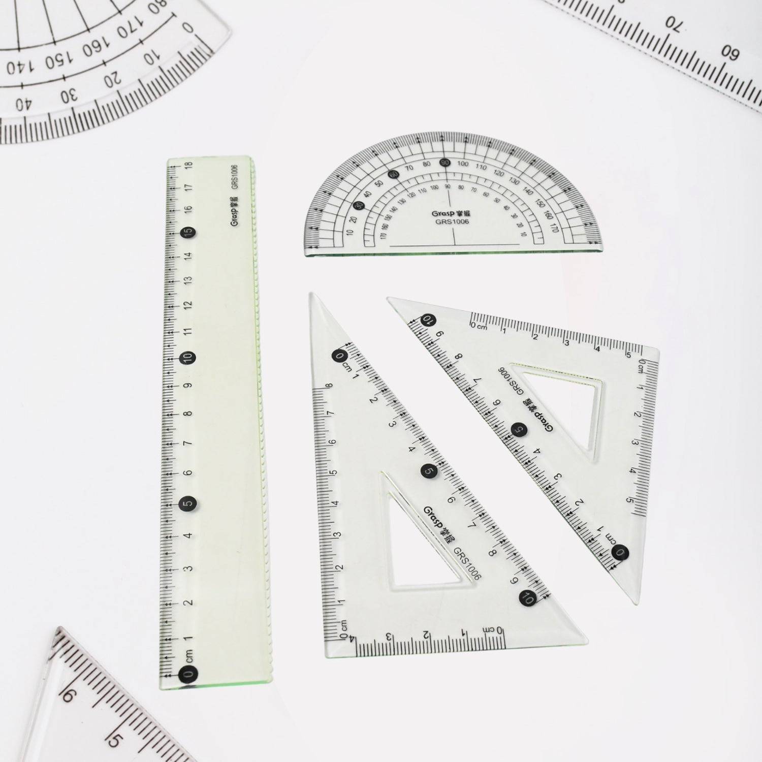 Transparent geometry kit with drafting ruler and triangle included