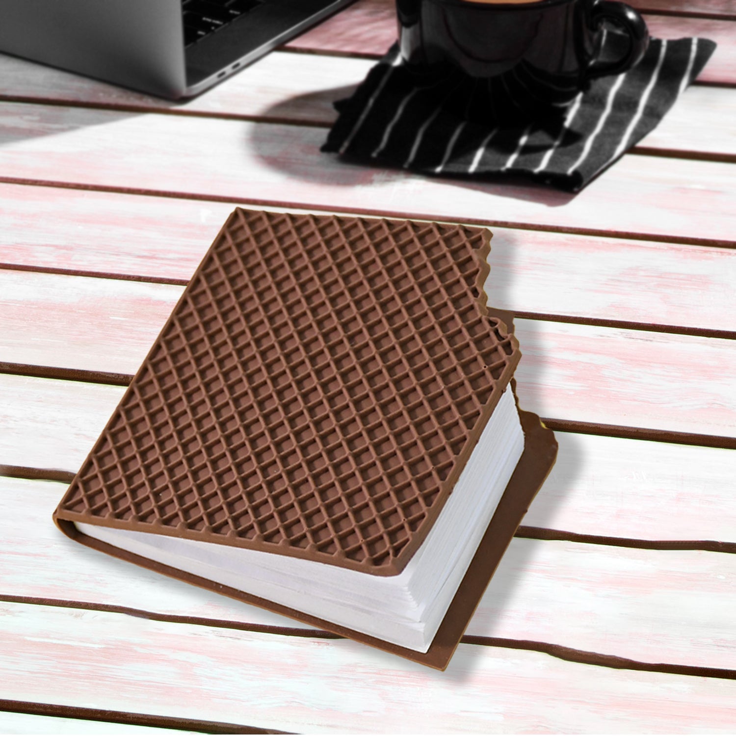 The Chocolate Diary Notebook displayed next to a pen, ready for creative use.