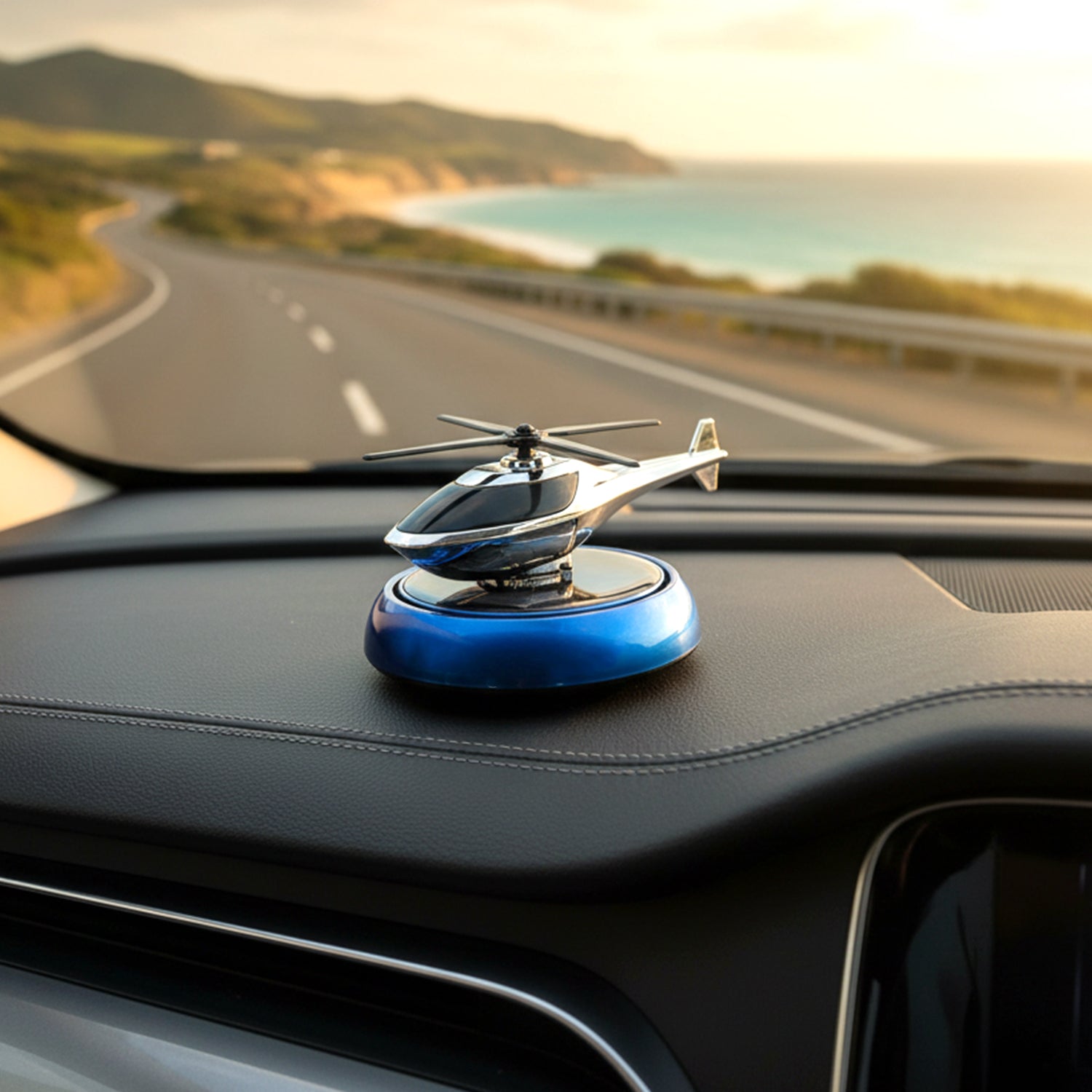 Decorative helicopter fragrance diffuser placed on car dashboard