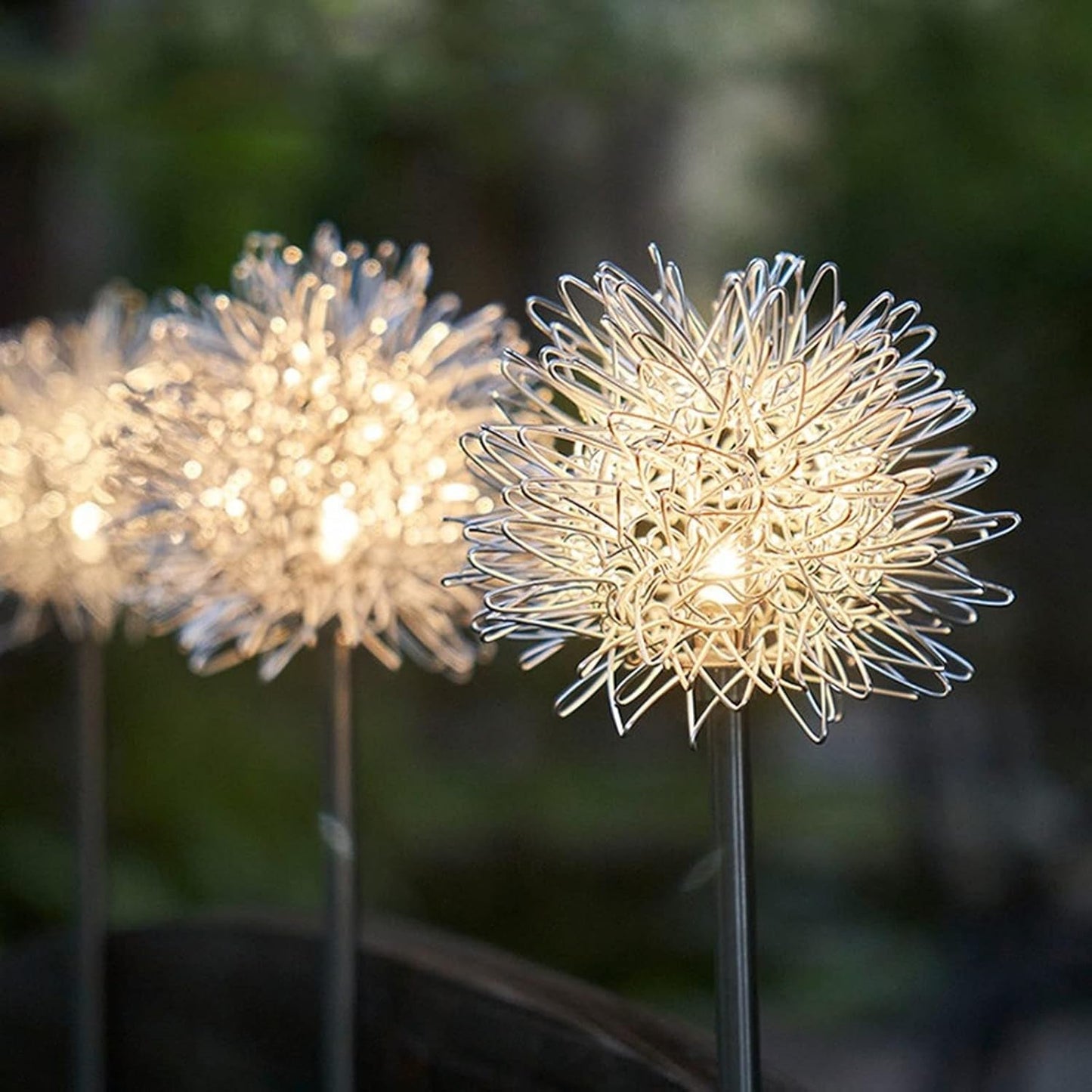 Solar LED dandelion garden lights displaying bright multicolor glow at night